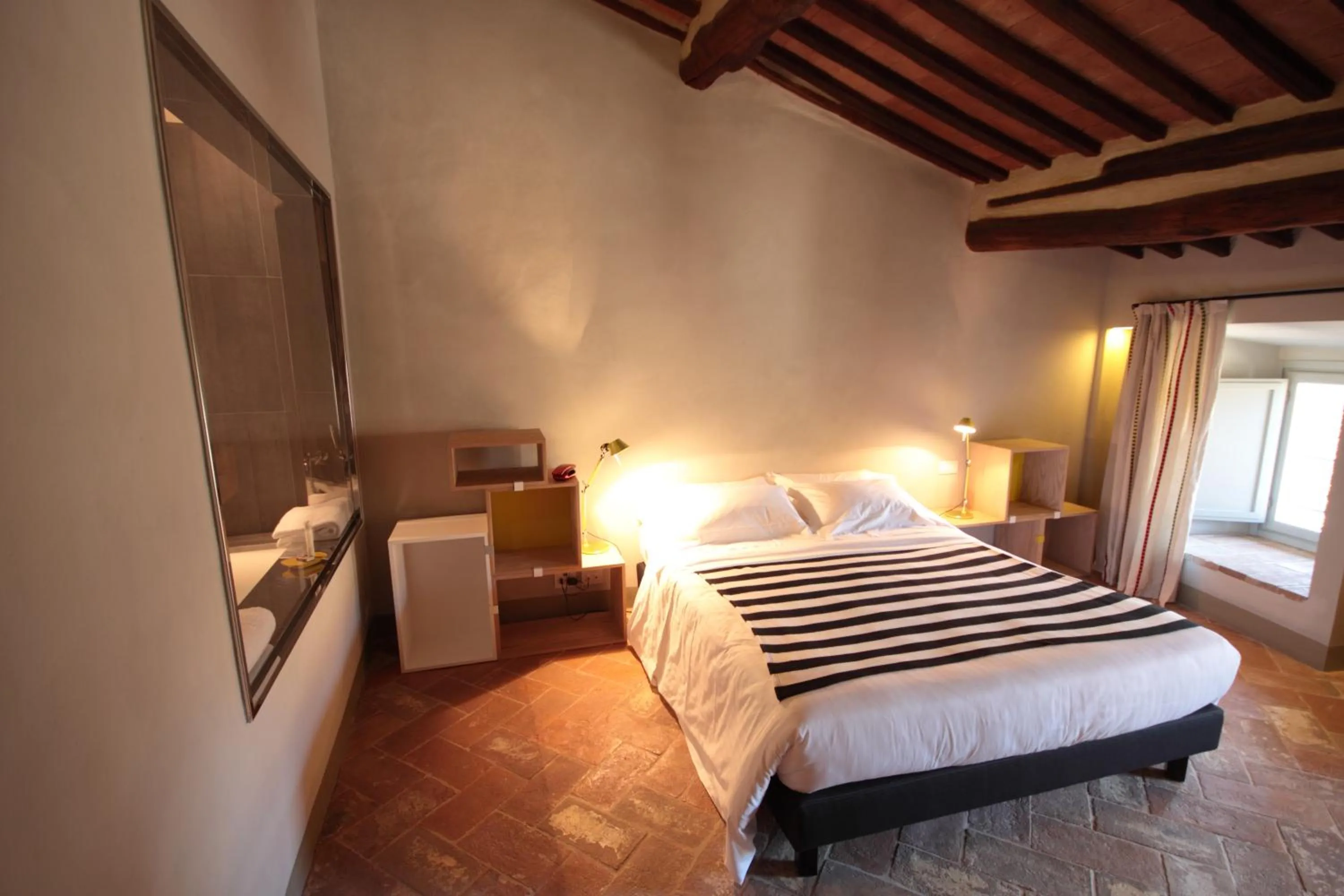 Bed in Palazzetto Rosso - Art Hotel