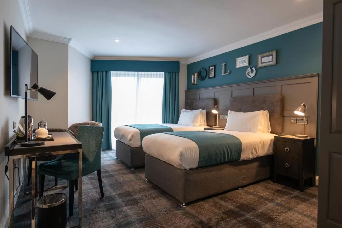 Bed in The Feathers Hotel