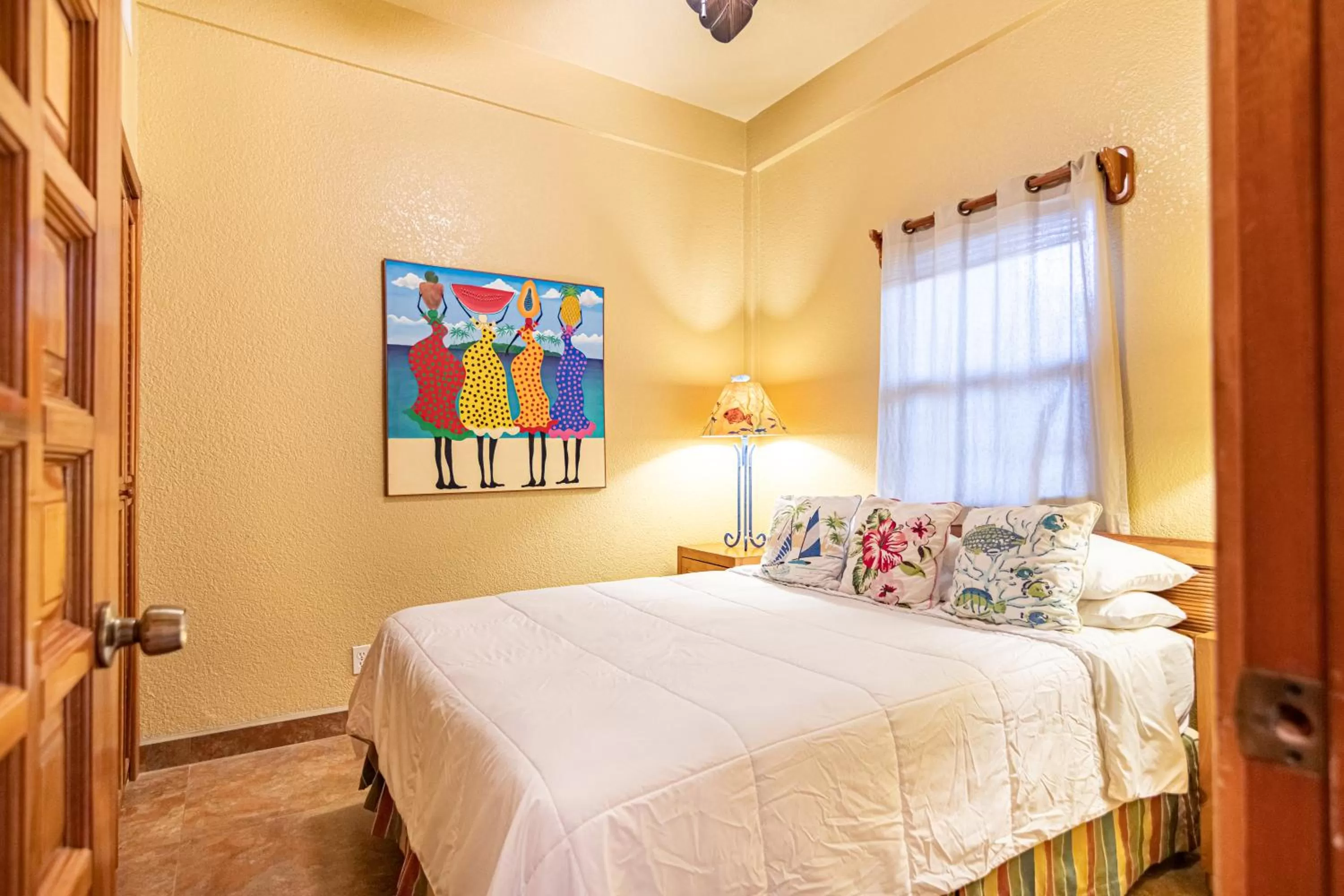 Bed in Lighthouse Beach Villas