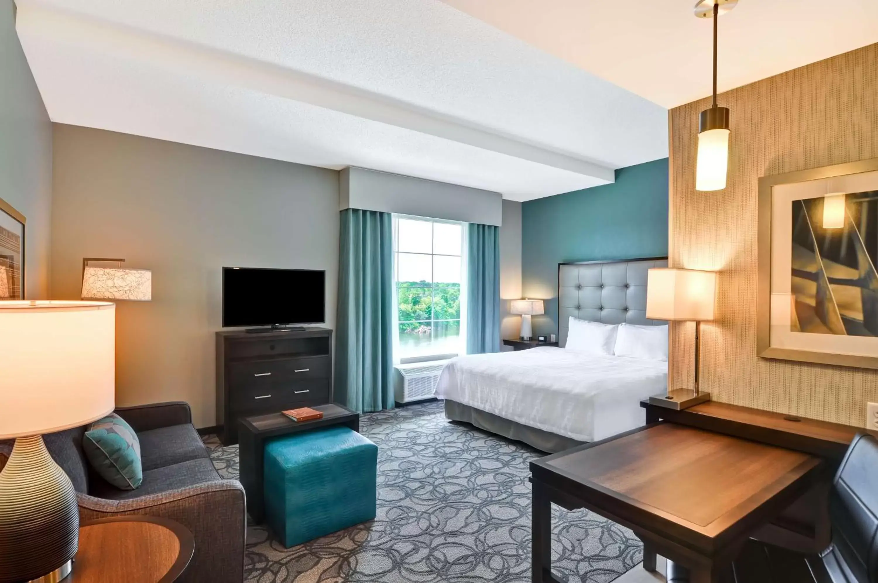 Bed, Seating Area in Homewood Suites By Hilton Schenectady