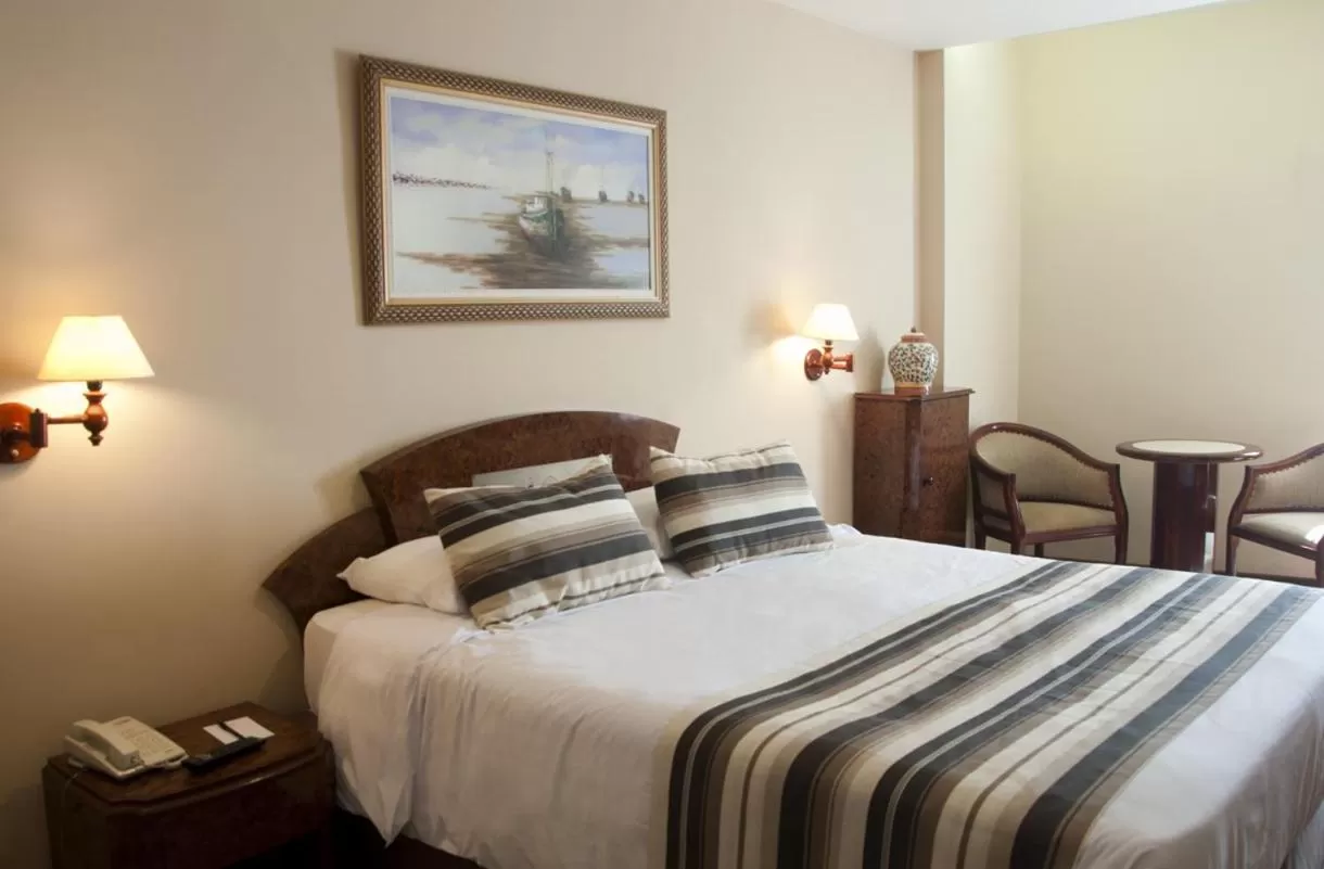 Bed in Augusto's Copacabana Hotel