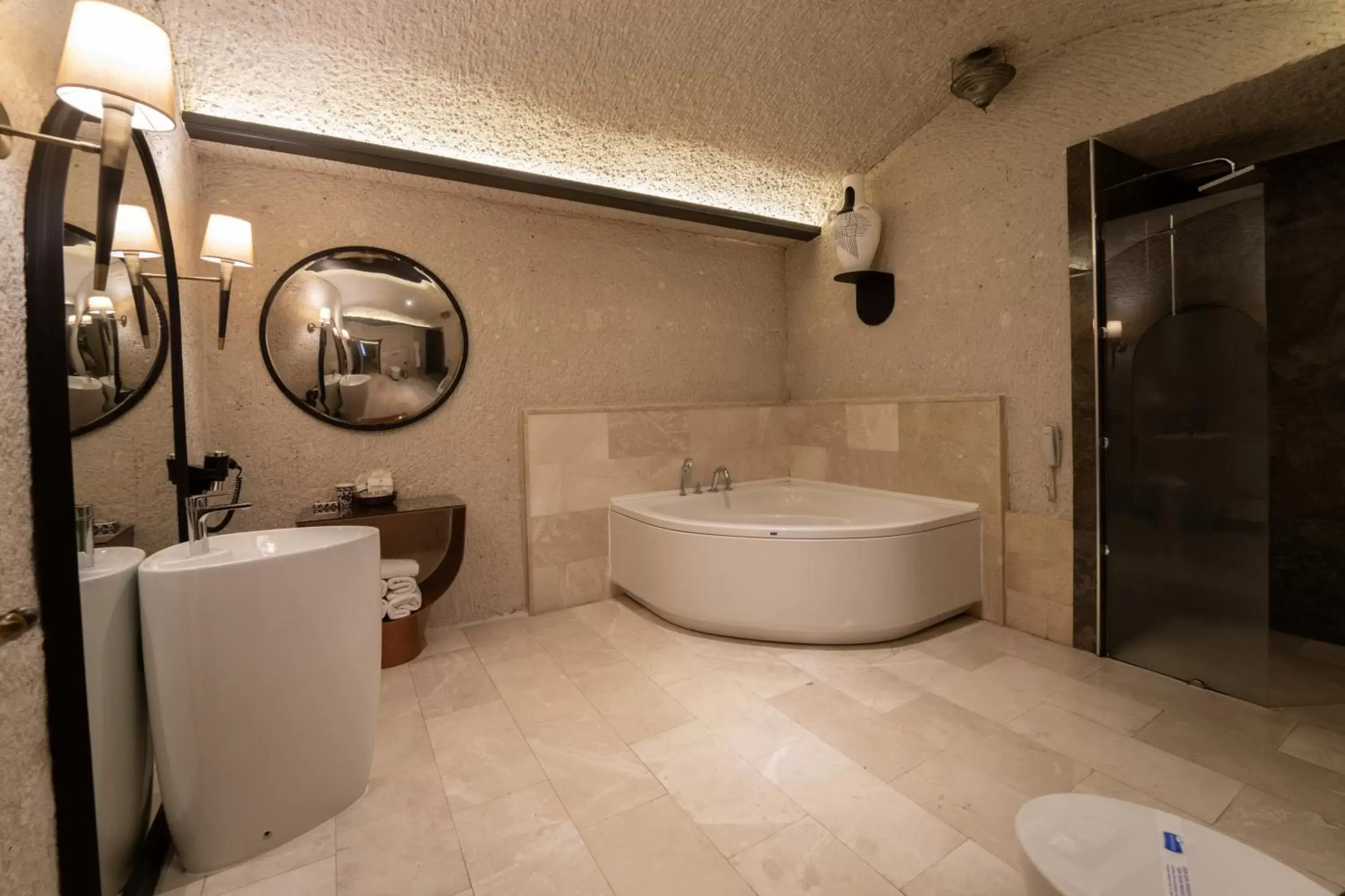 Bathroom in Artemis Cave Suites & Spa- Adults Only