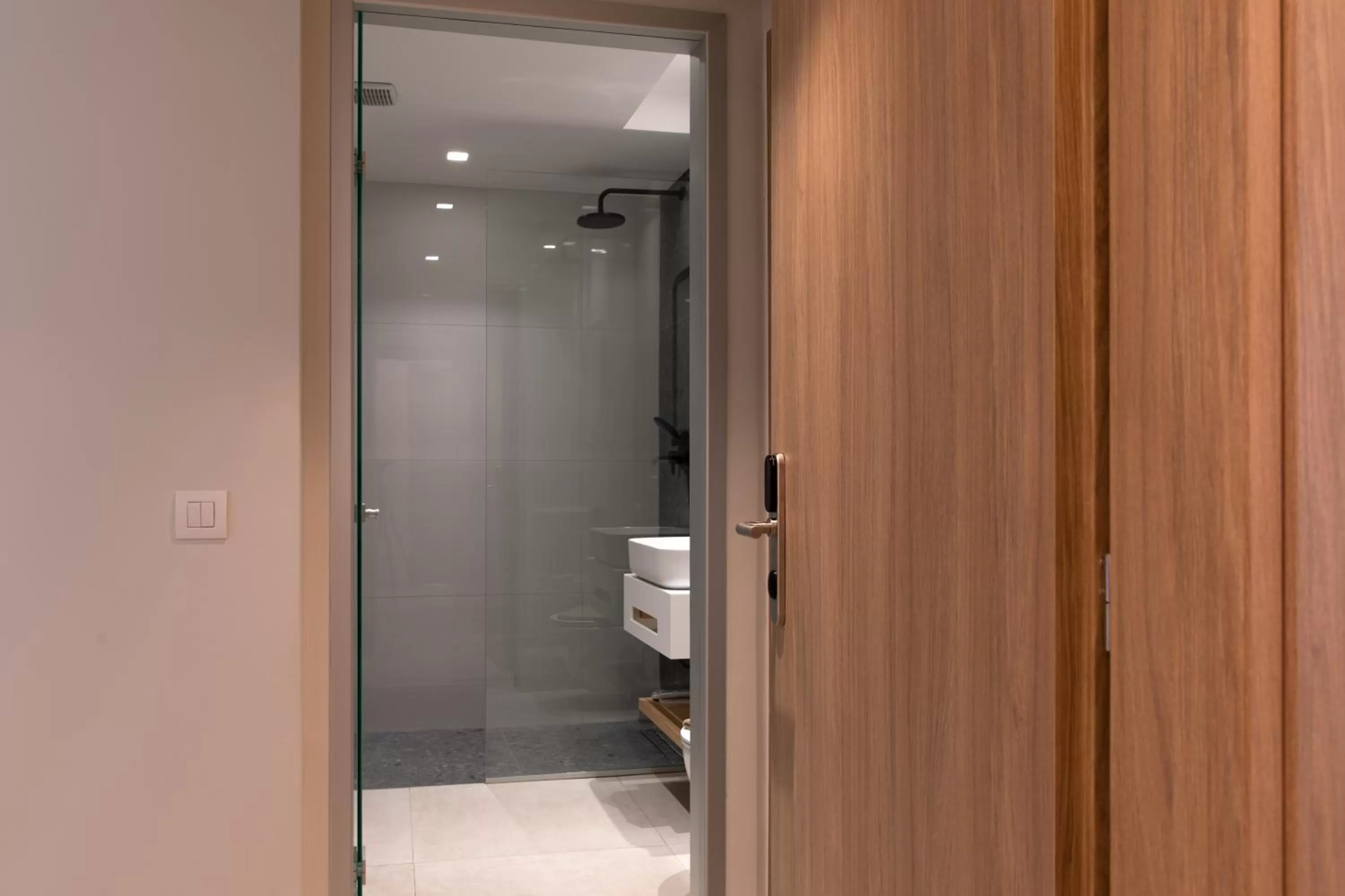 Bathroom in Agrelli Hotel & Suites