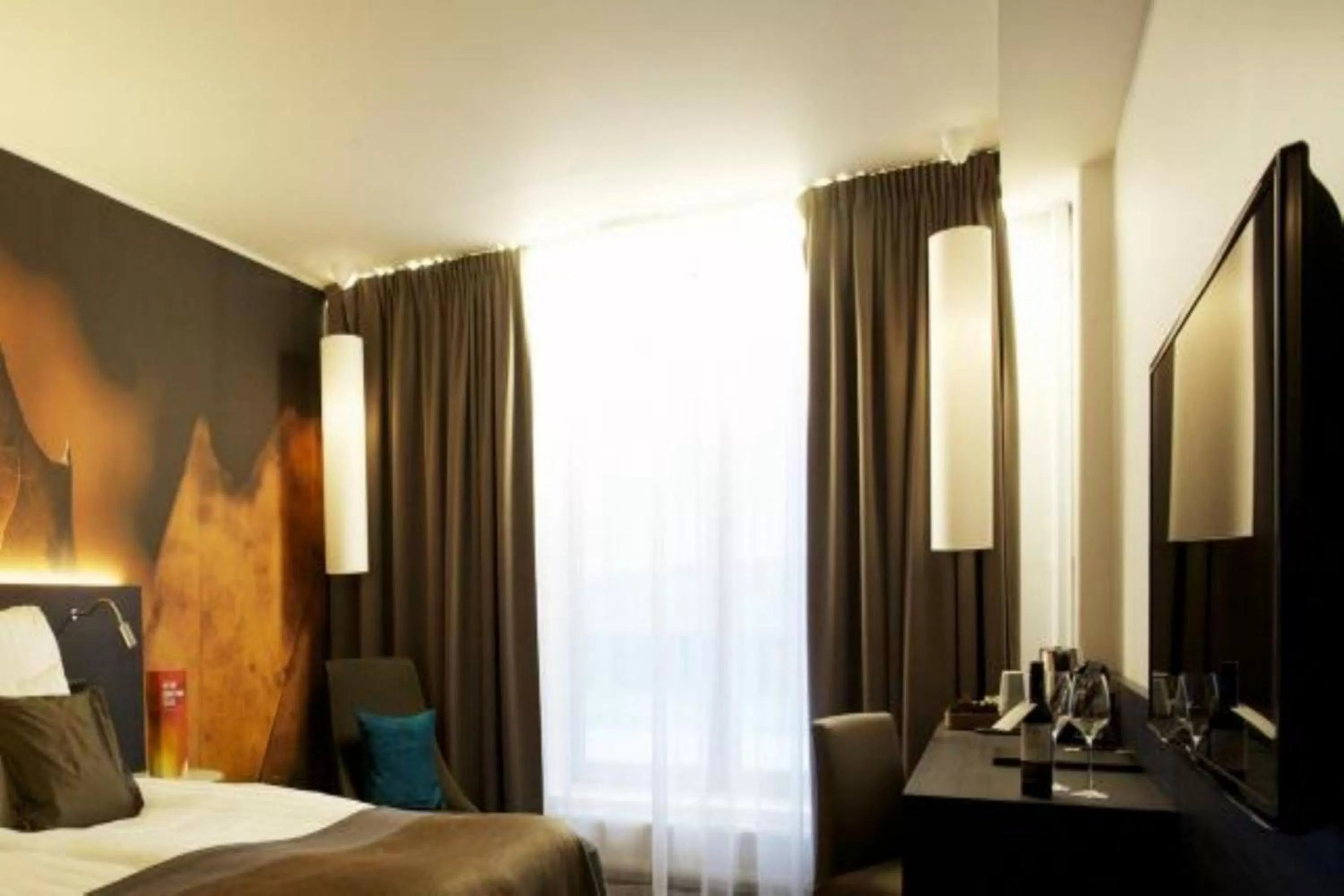 Photo of the whole room, Bed in Clarion Hotel Sense