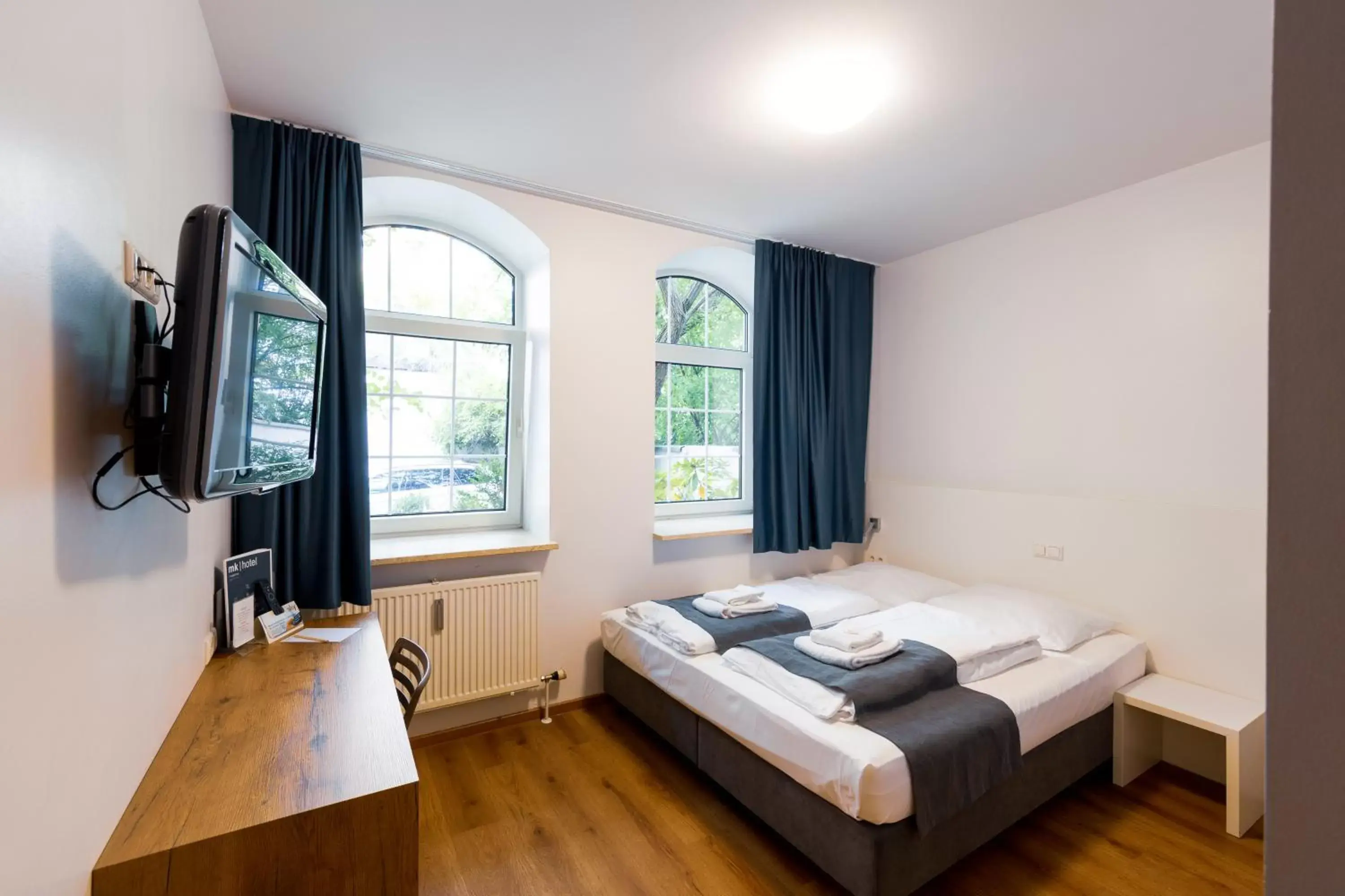 Bedroom in mk hotel münchen max-weber-platz