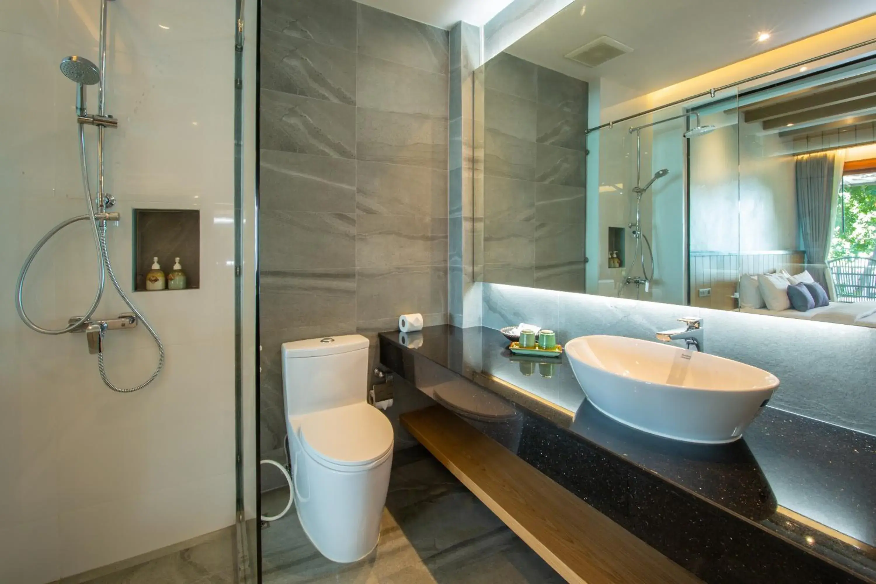 Bathroom in Coral Cliff Beach Resort Samui - SHA Plus