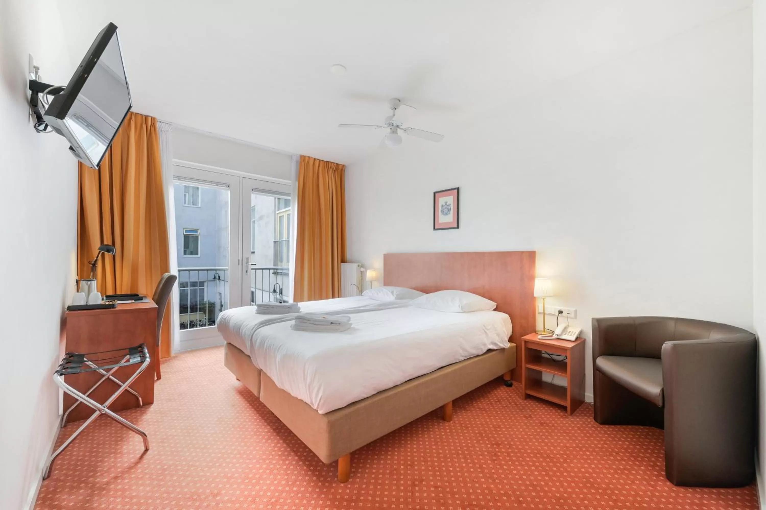 Photo of the whole room, Bed in Ambassador City Centre Hotel