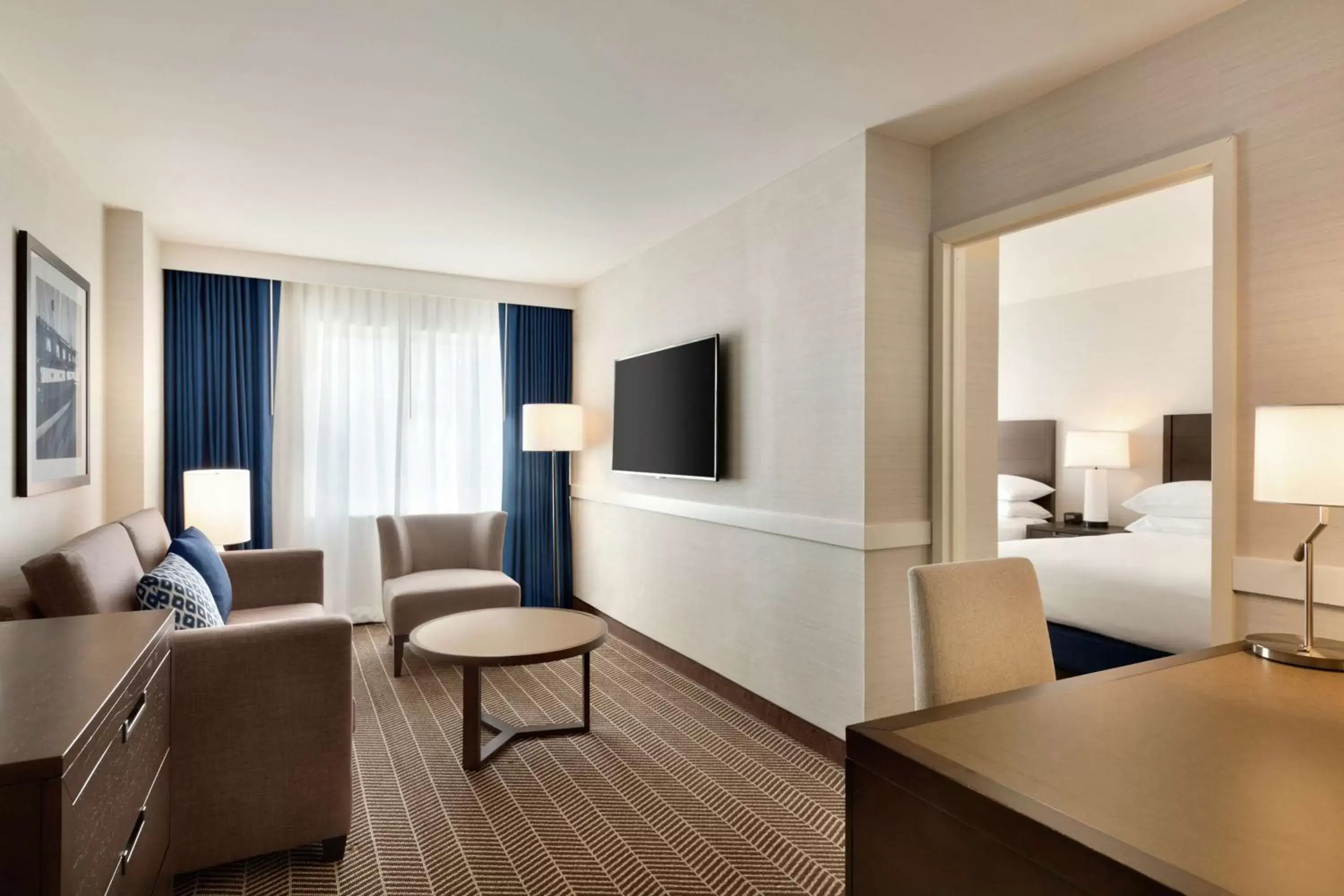 Living room, Seating Area in Embassy Suites Boston at Logan Airport