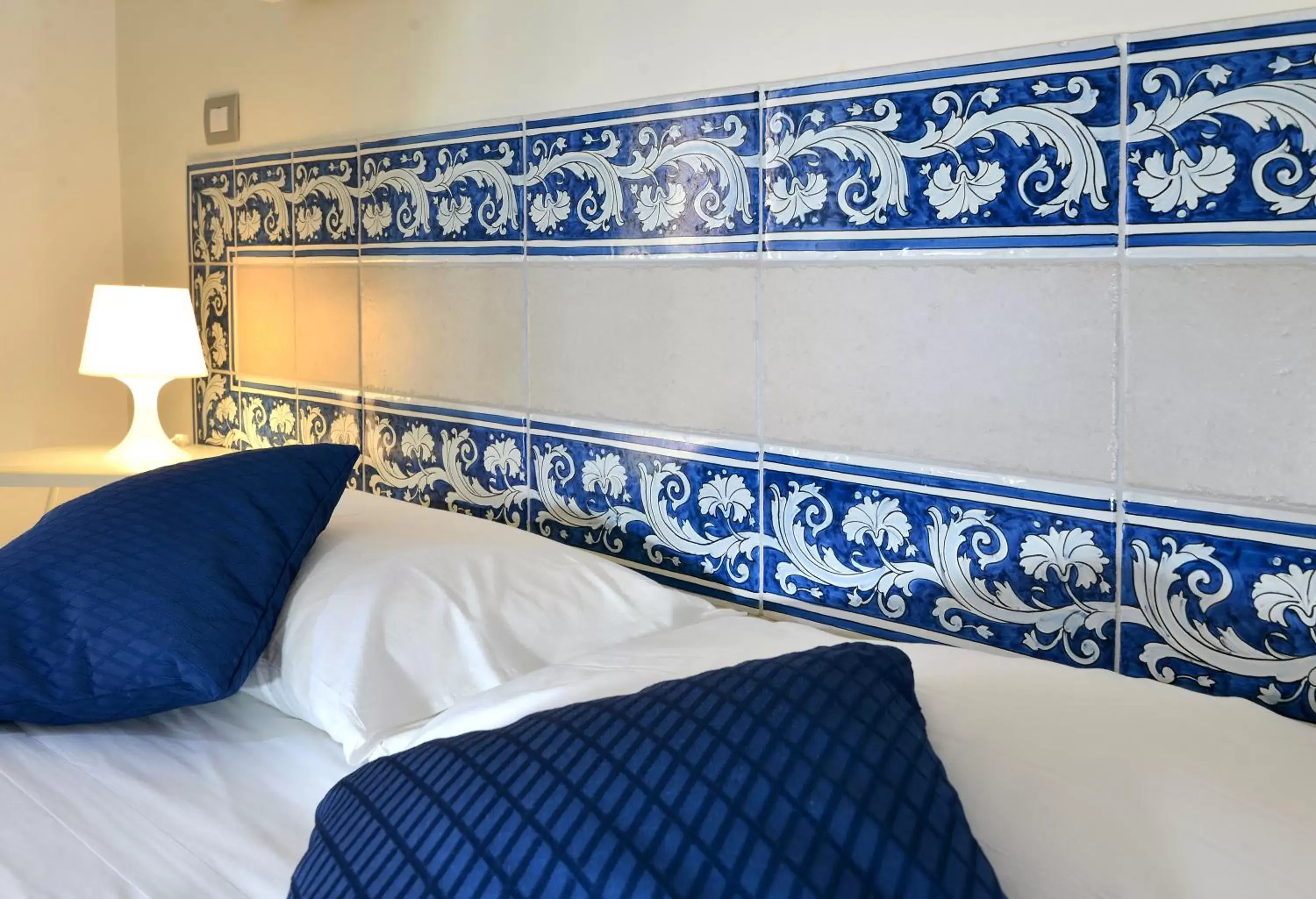 Decorative detail, Bed in Santi e Saraceni Rooms Decorative detail, Bed in Santi e Saraceni Rooms