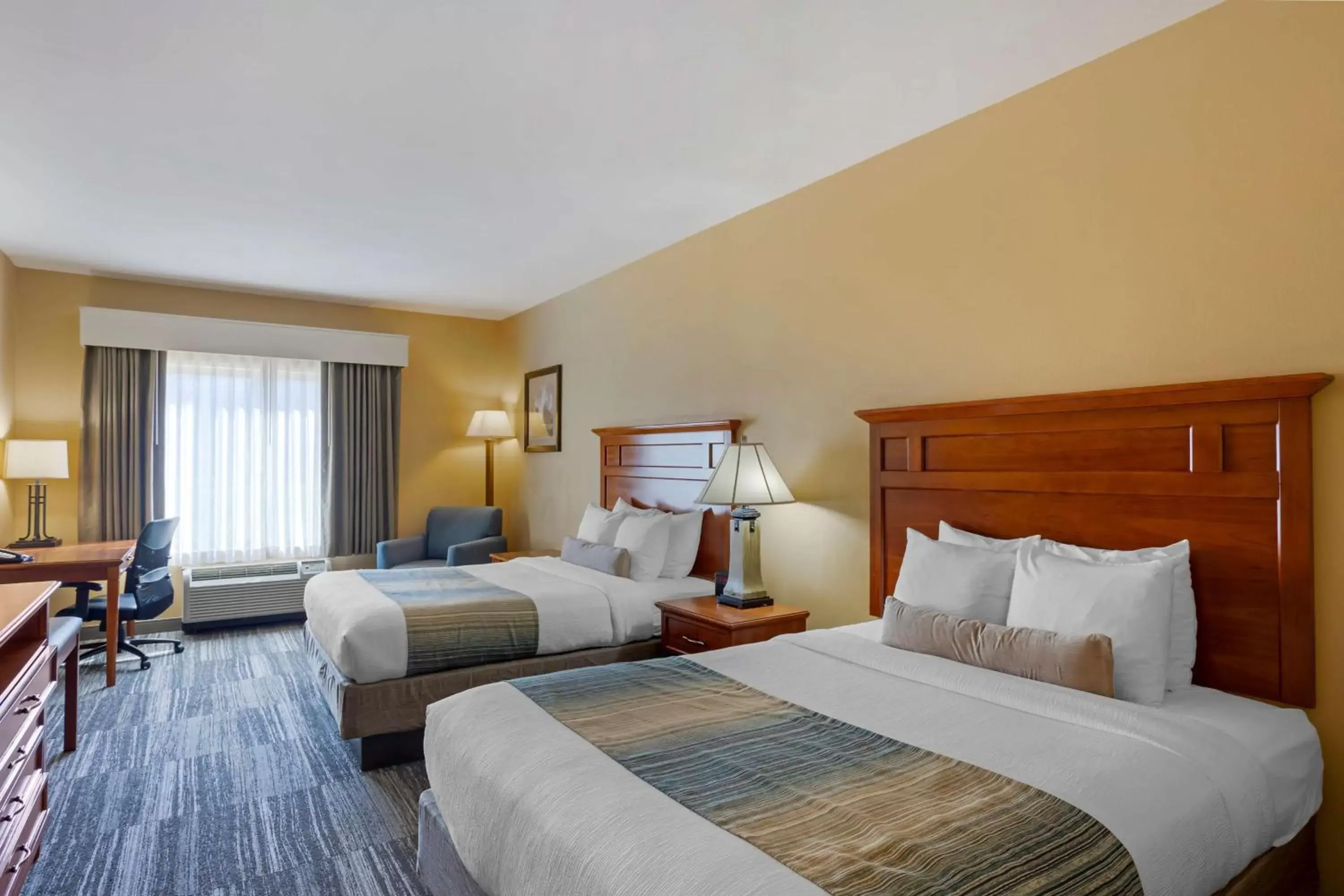 Bedroom, Bed in Best Western PLUS University Park Inn & Suites