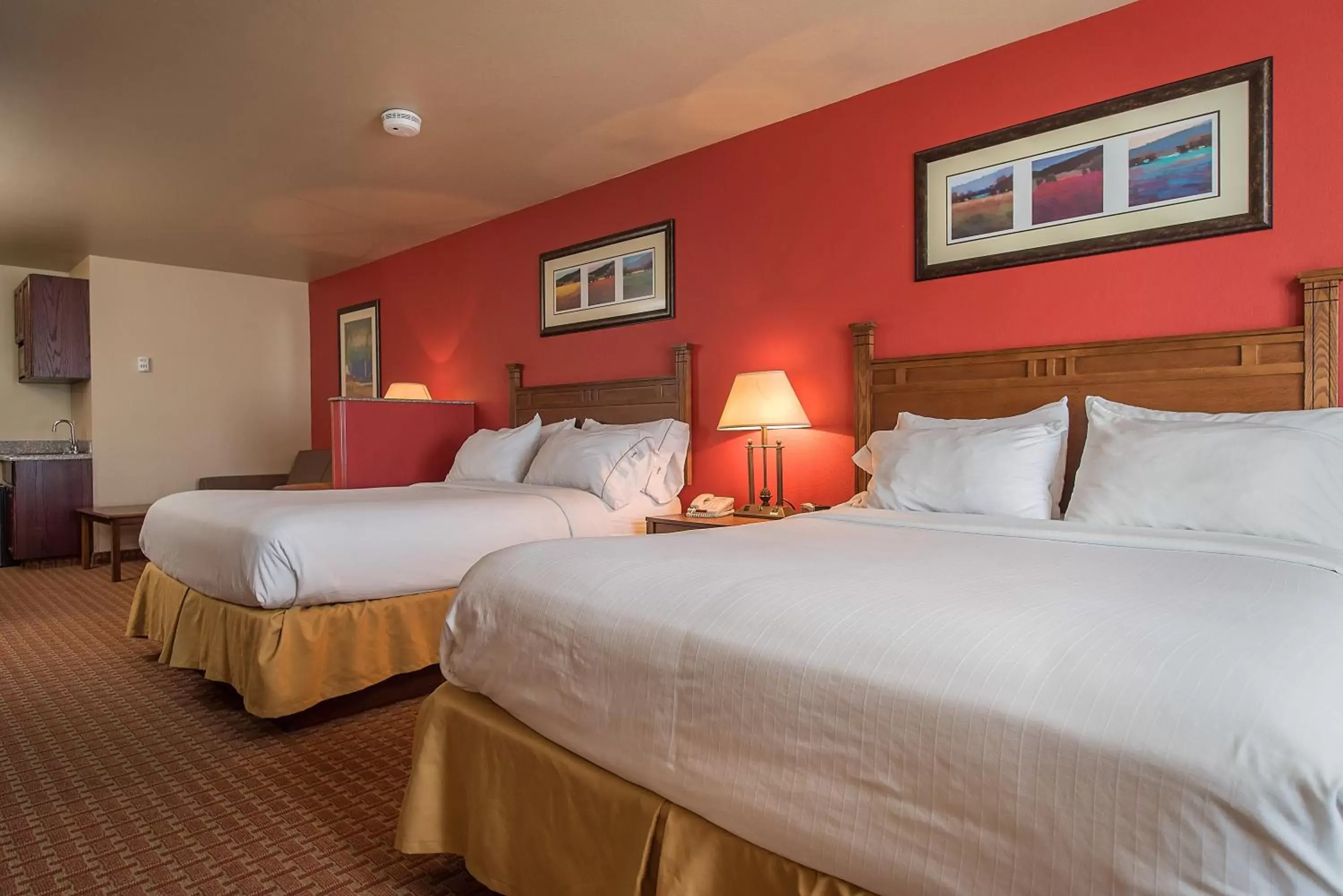 Bed in Baymont Inn & Suites by Wyndham Sturgis Bed in Baymont Inn & Suites by Wyndham Sturgis