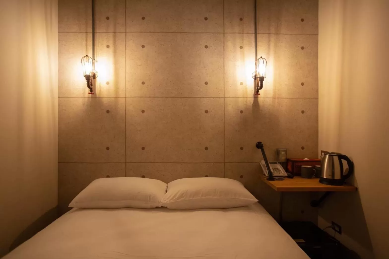 Bed in The Rooms Inn