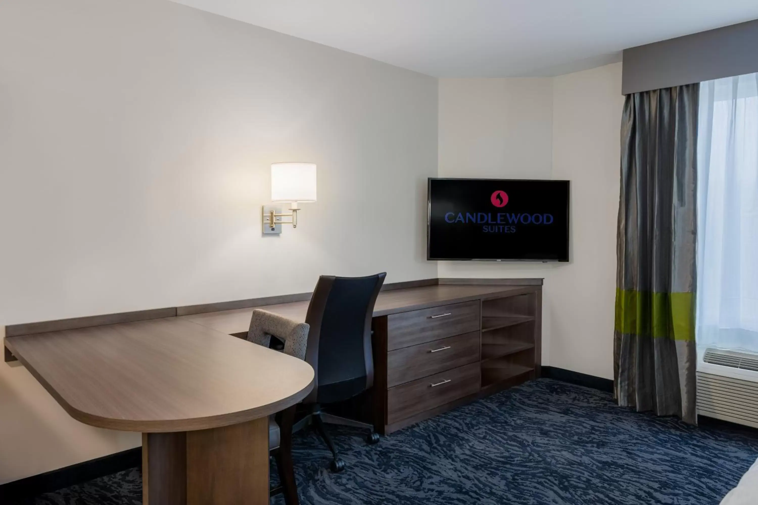 Bedroom, TV/Entertainment Center in Candlewood Suites Cookeville, an IHG Hotel