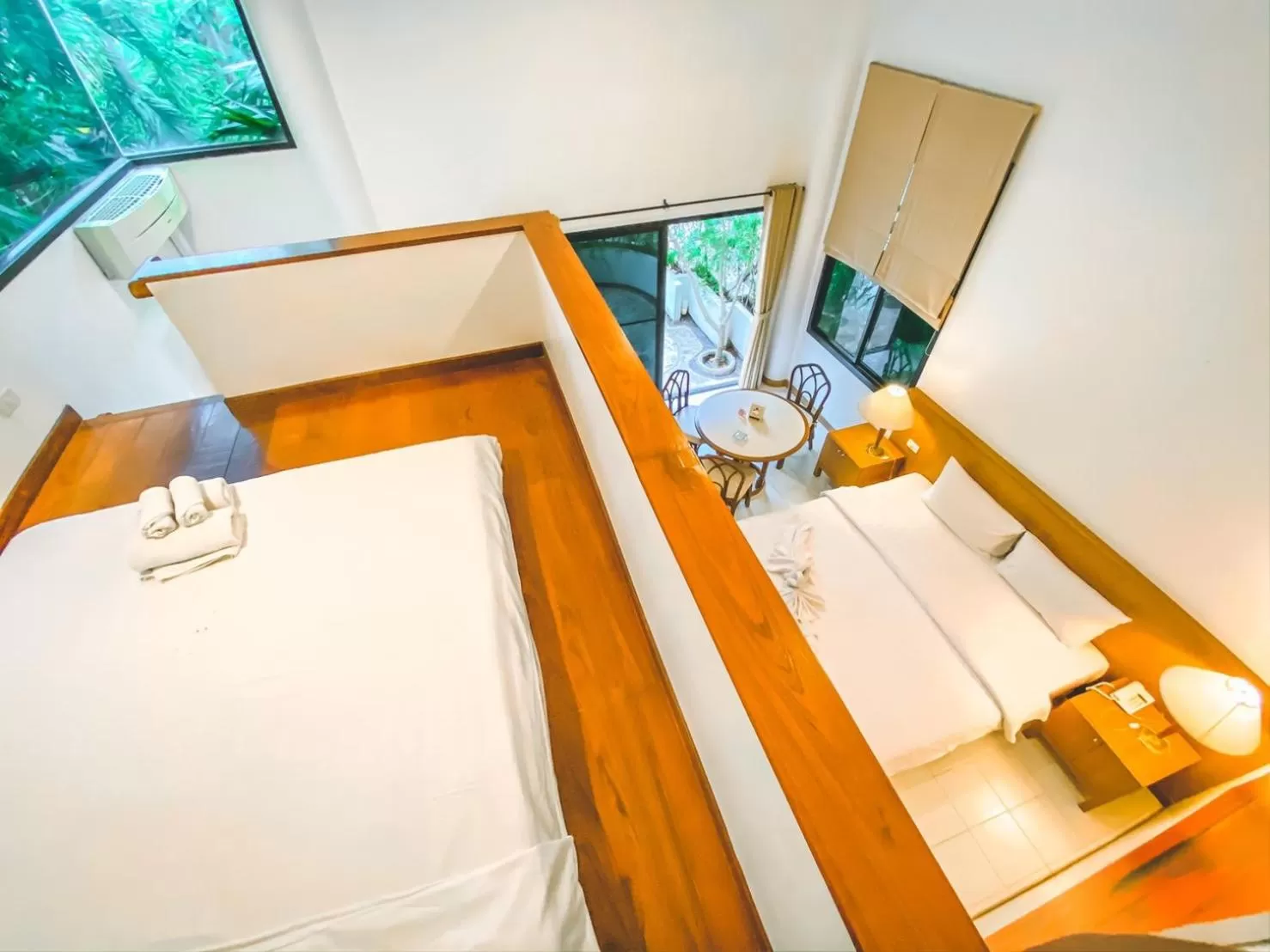 Bed in Nern Chalet Beachfront Hotel