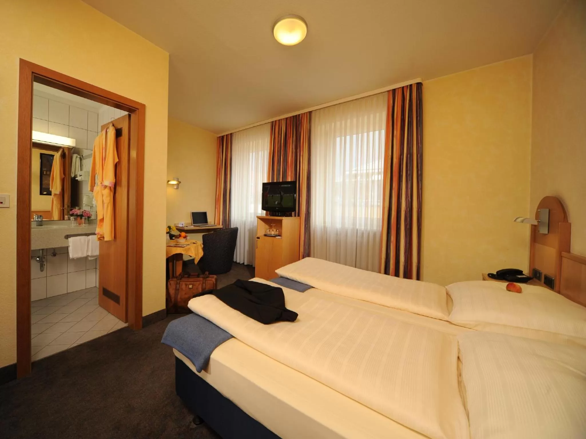 Bed in City Partner Hotel Strauss