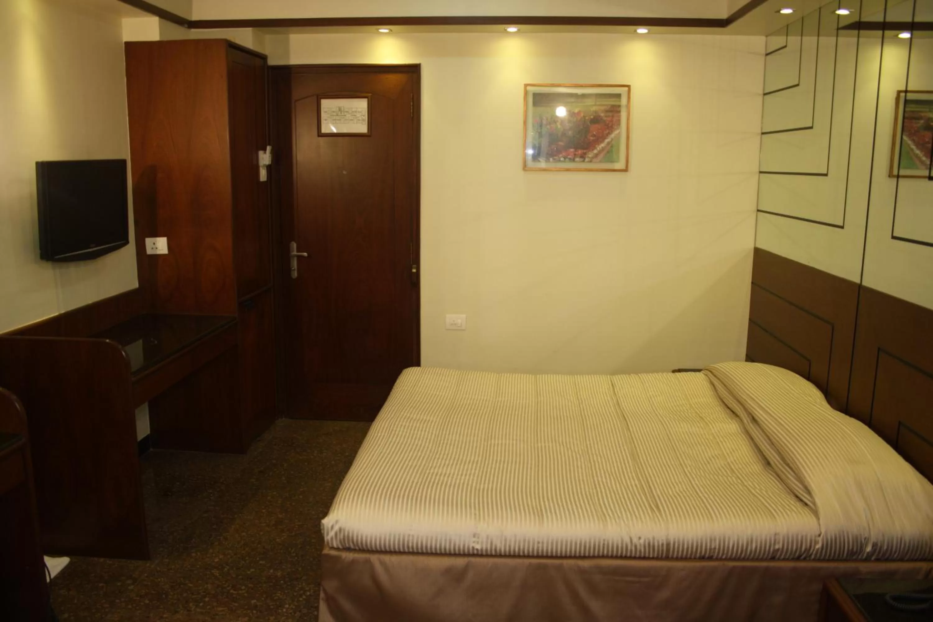 Photo of the whole room, Bed in Hotel Karl Residency