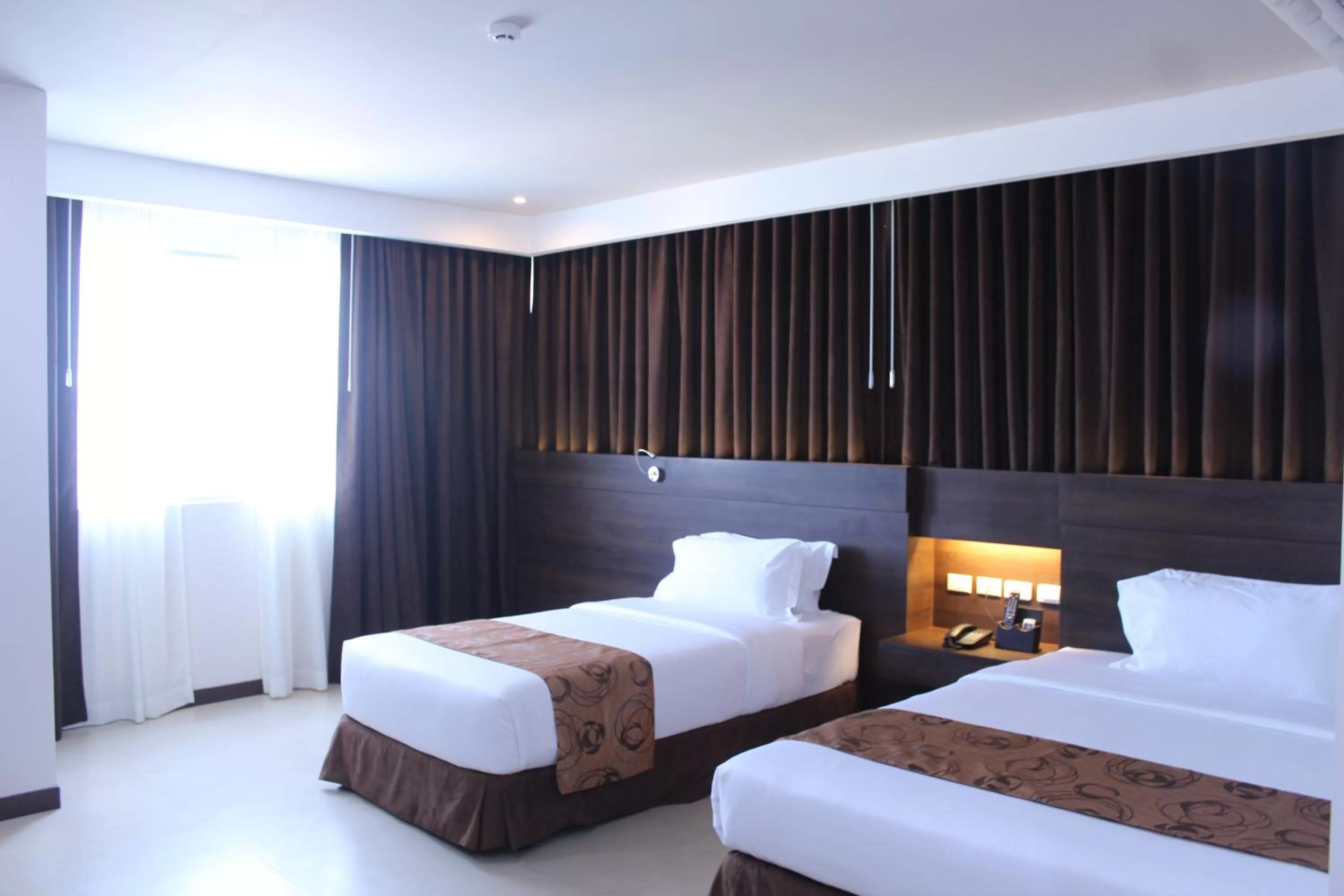 Bed in Kew Hotel Tagbilaran