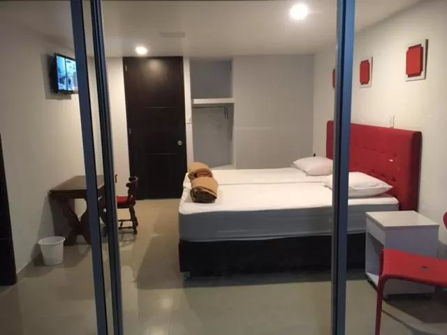 Bed in Hotel Garden City Boutique