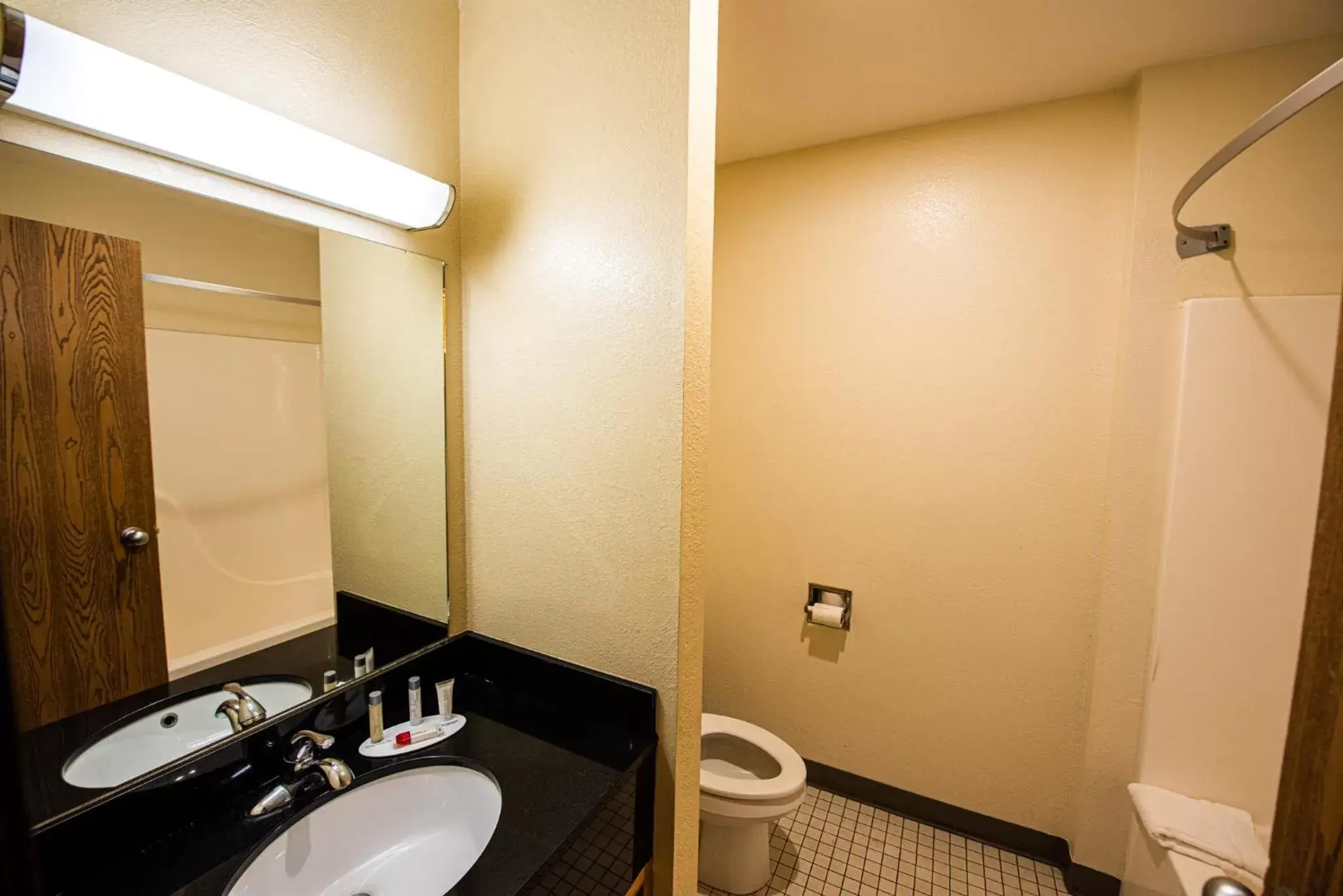 Bathroom in Super 8 by Wyndham Bridgeview of Mackinaw City