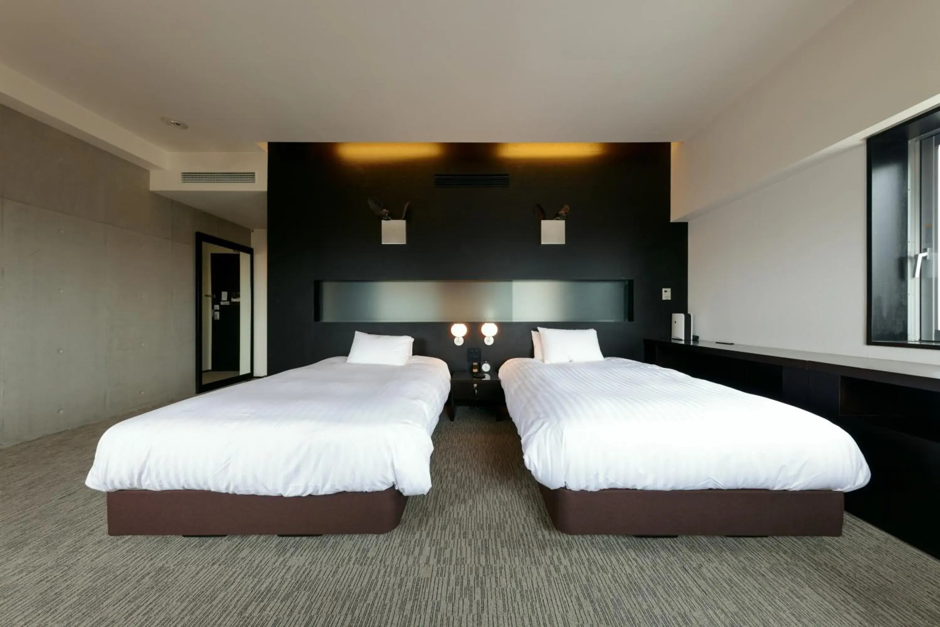 Bed in Furano Natulux Hotel