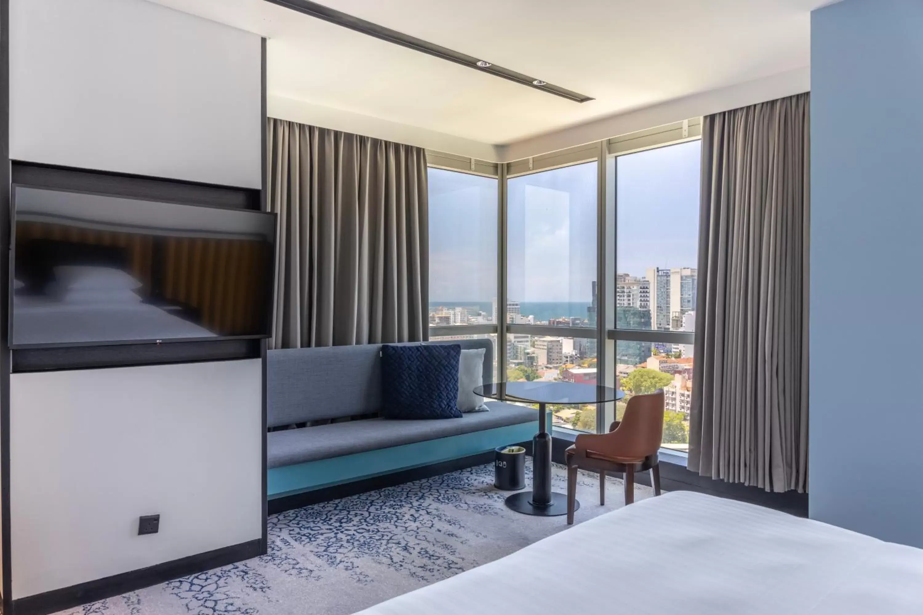 Bed, Seating Area in Courtyard by Marriott Colombo