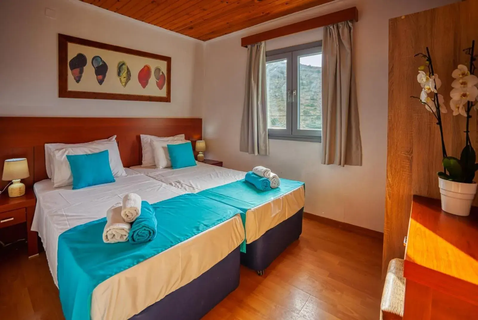 Bed in Elounda Water Park Residence Hotel