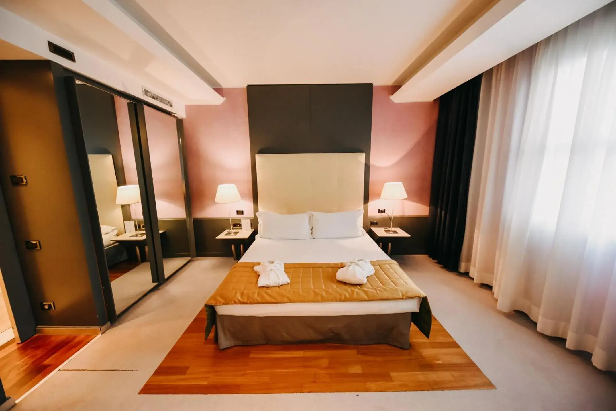 Bed in SHG Hotel Antonella