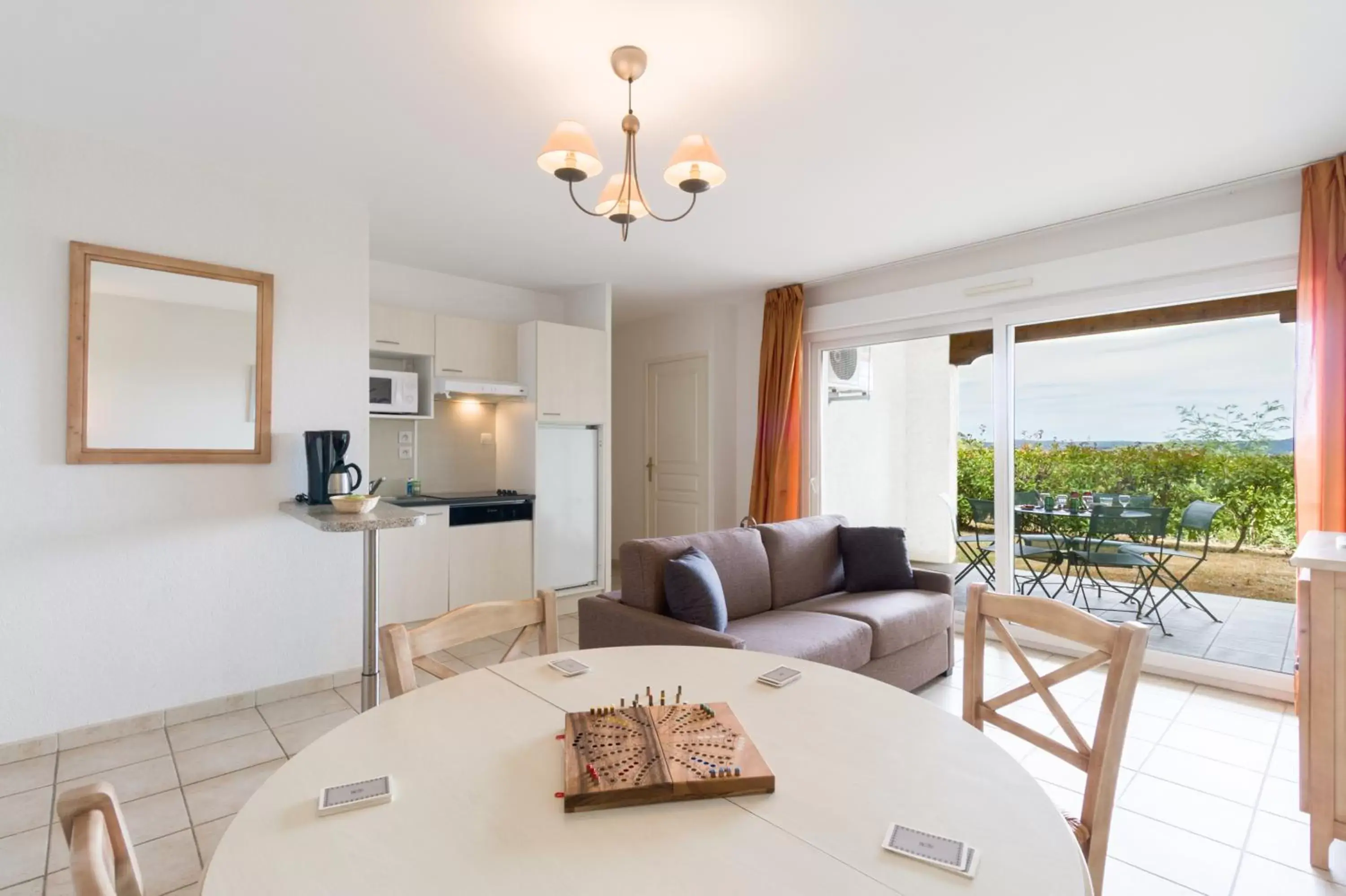 Living room, Dining Area in Garden & City Les Bastides de Grimaud