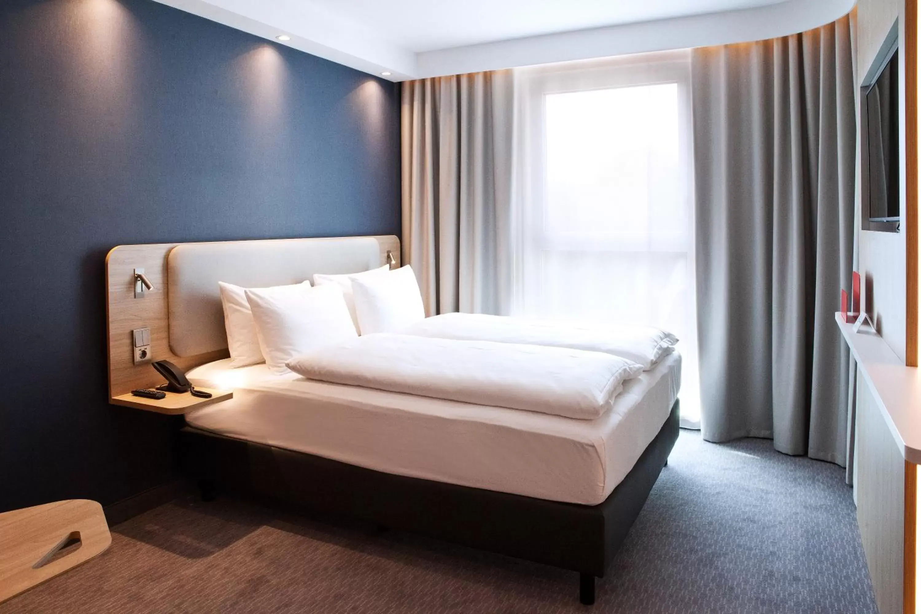 Bed in Holiday Inn Express - Offenburg, an IHG Hotel