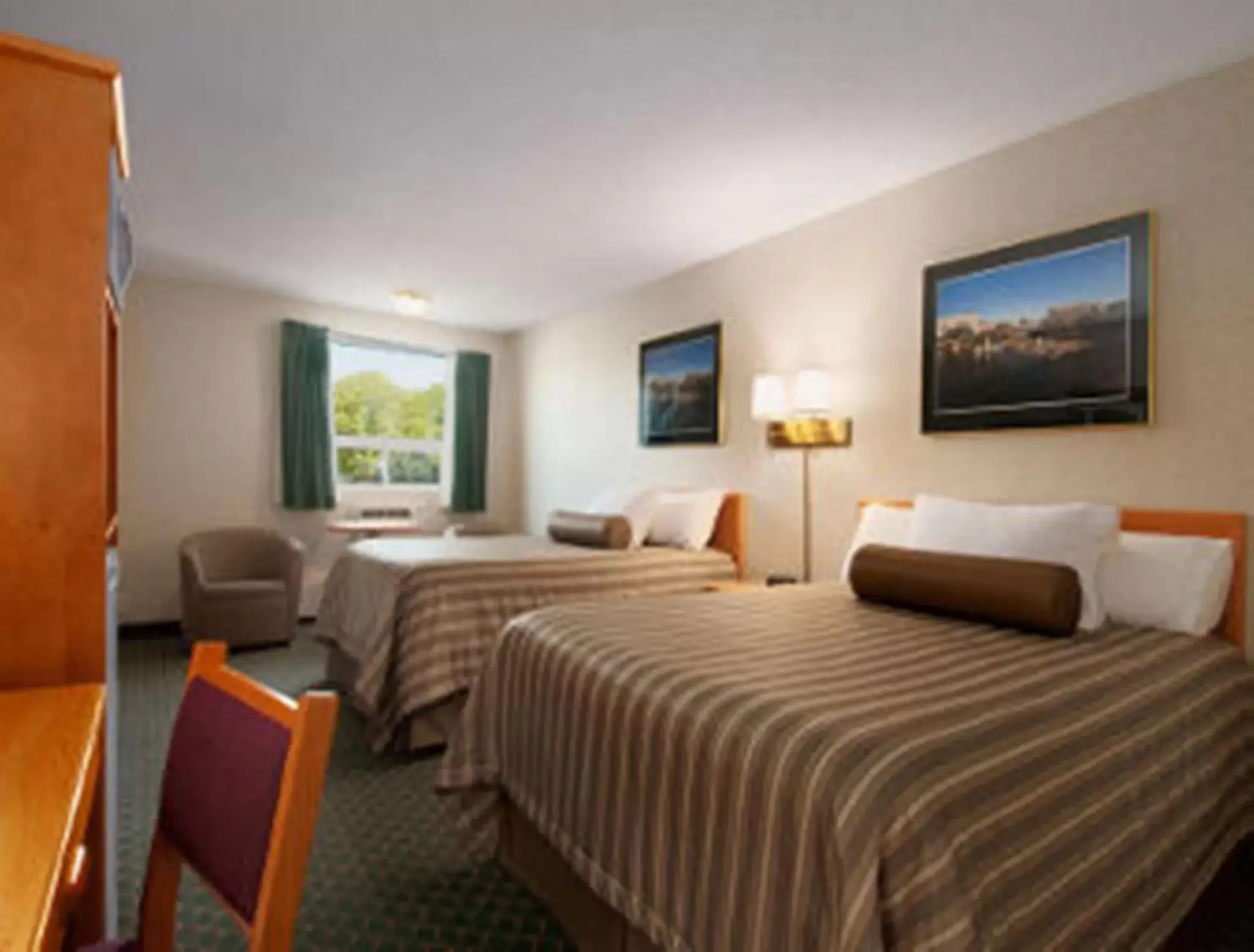 Bed in Travelodge by Wyndham Winnipeg East