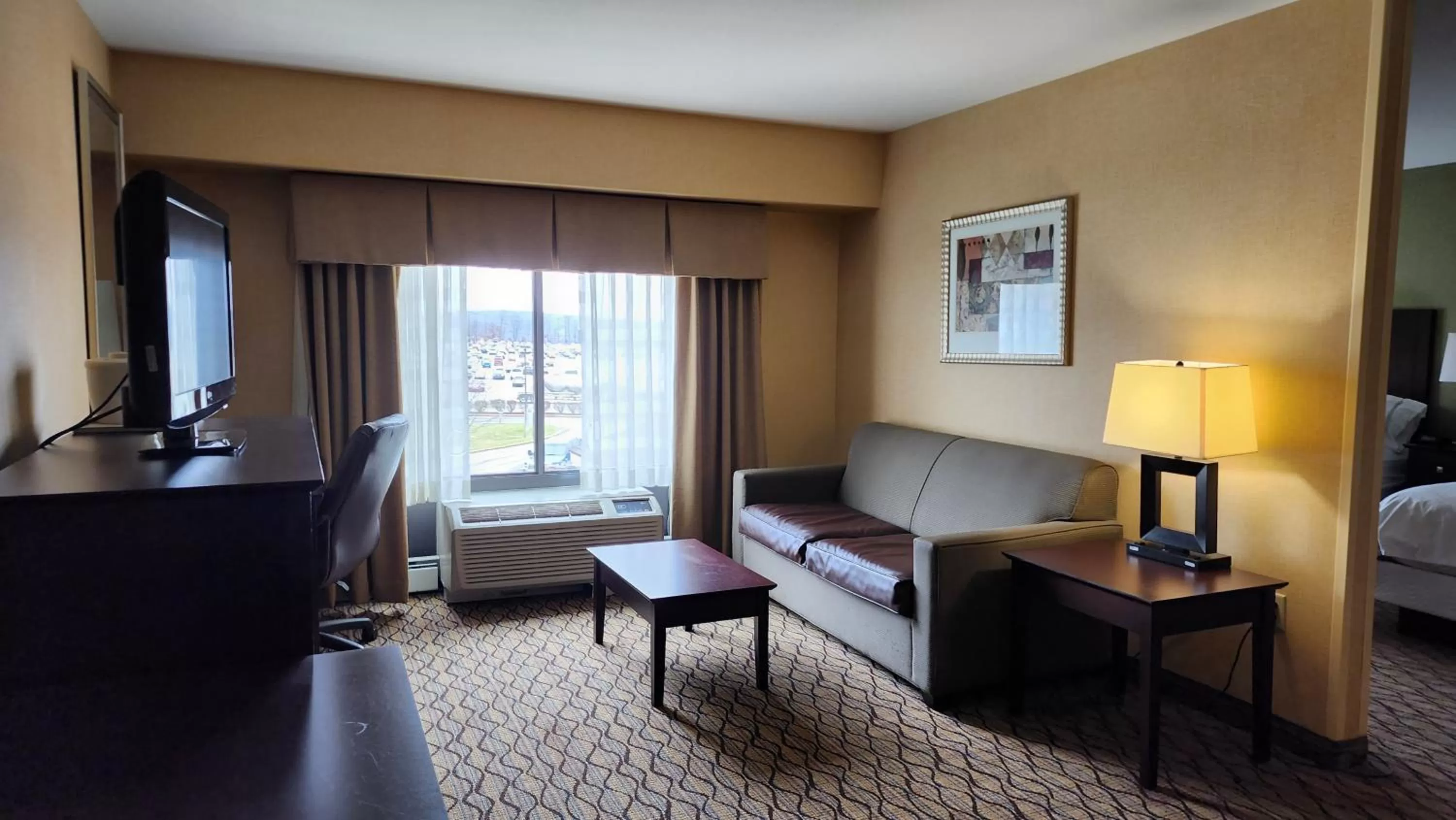 Communal lounge/ TV room in Wingate by Wyndham Kittanning