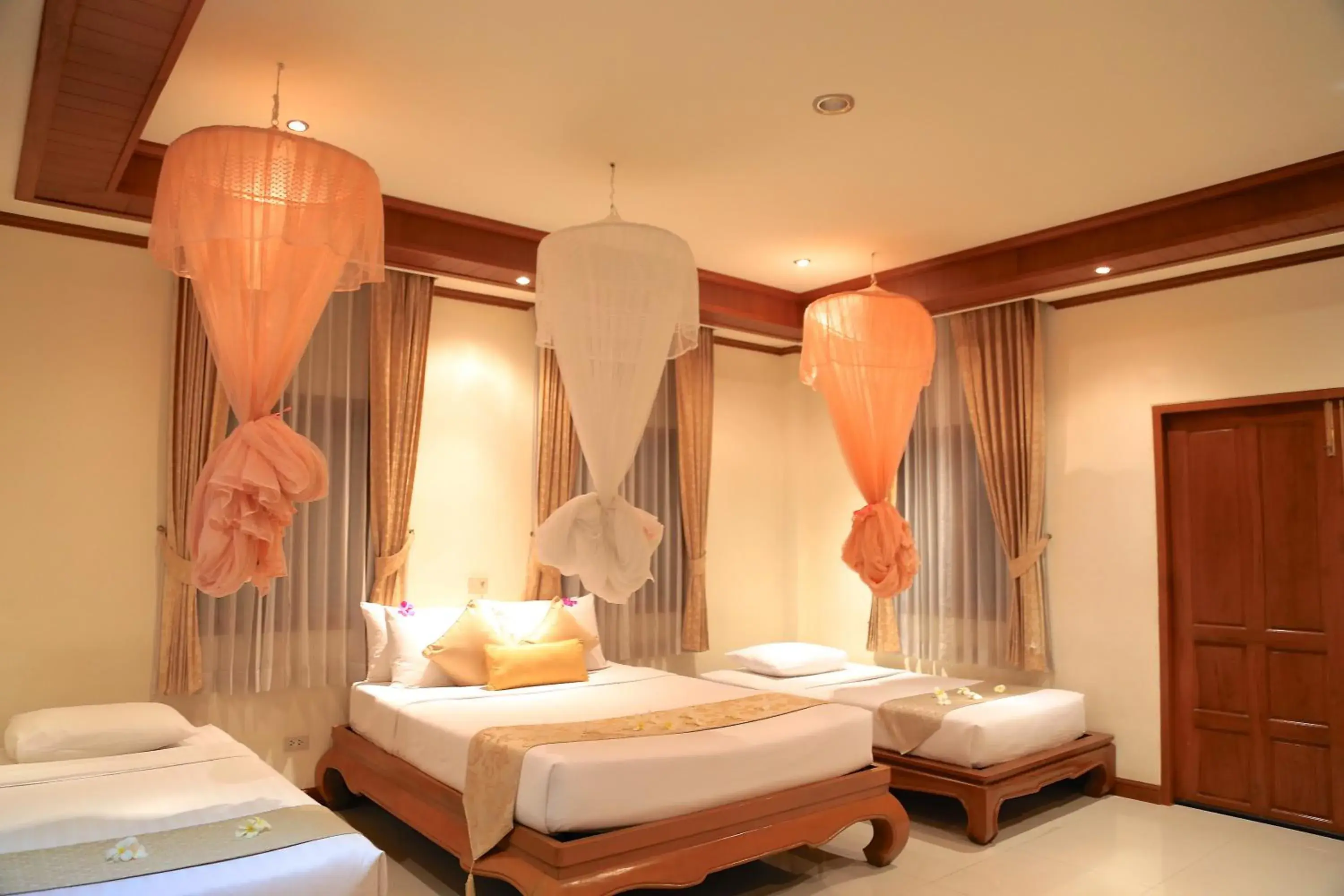 Property building, Bed in Oriental Siam Resort