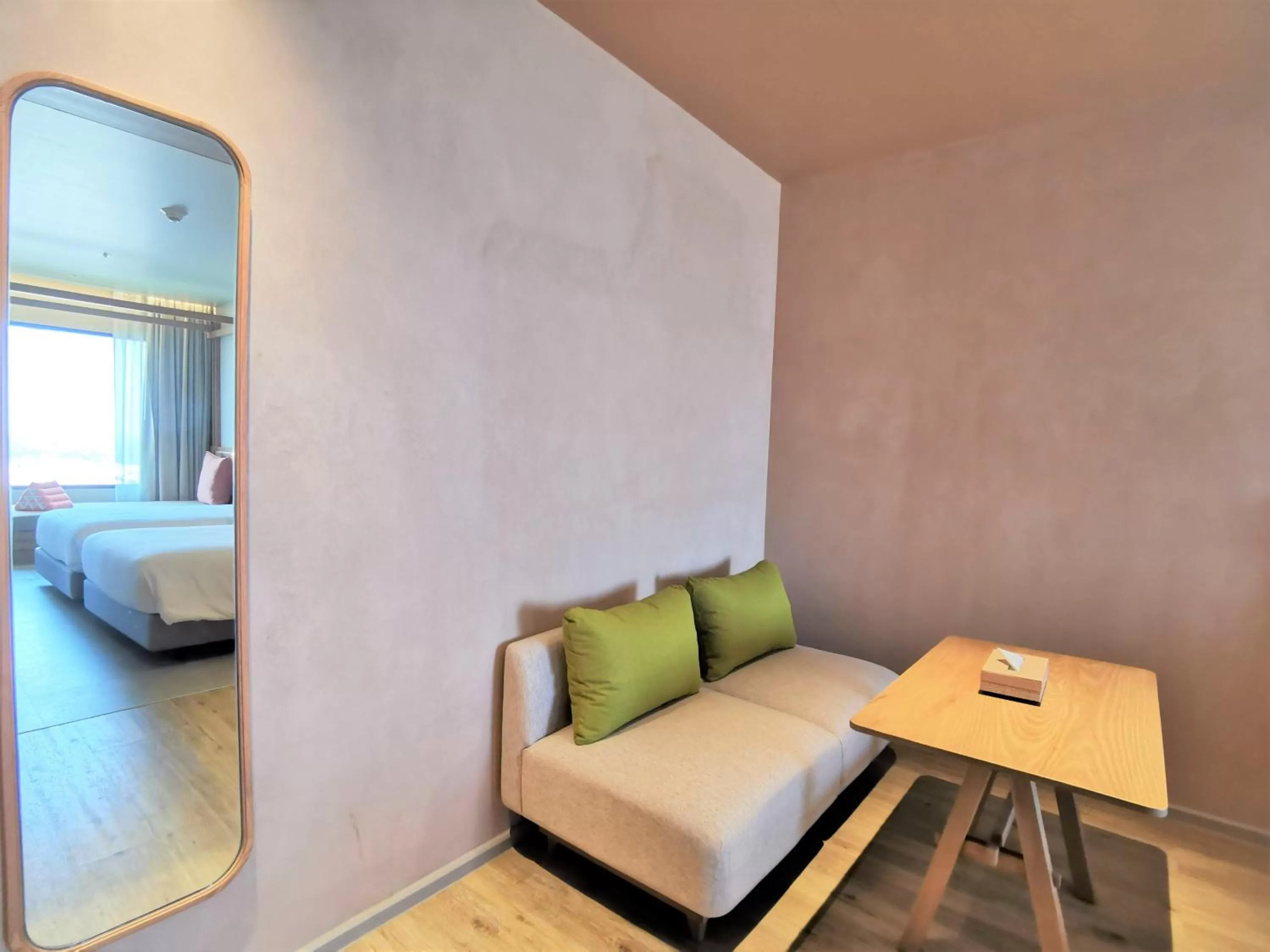 Seating area, Bed in Centara Korat