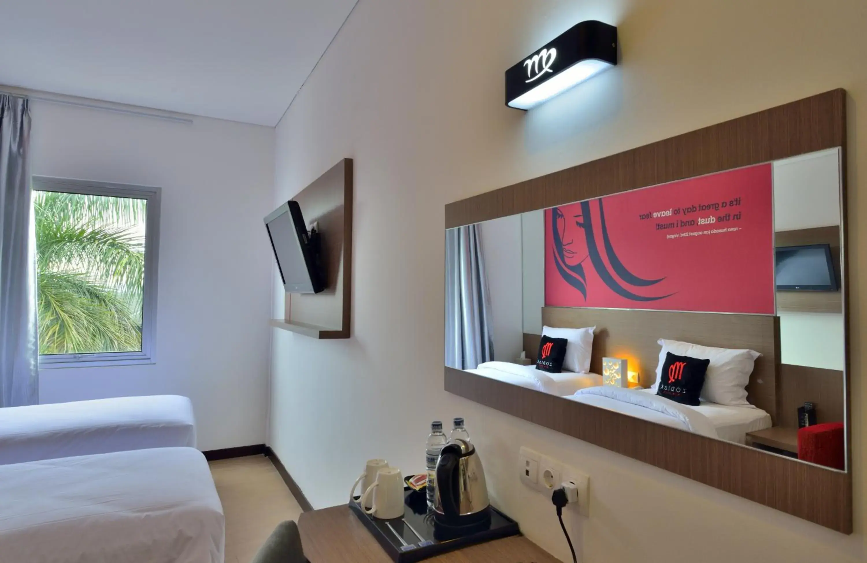 Bedroom in Zodiak Sutami by KAGUM Hotels