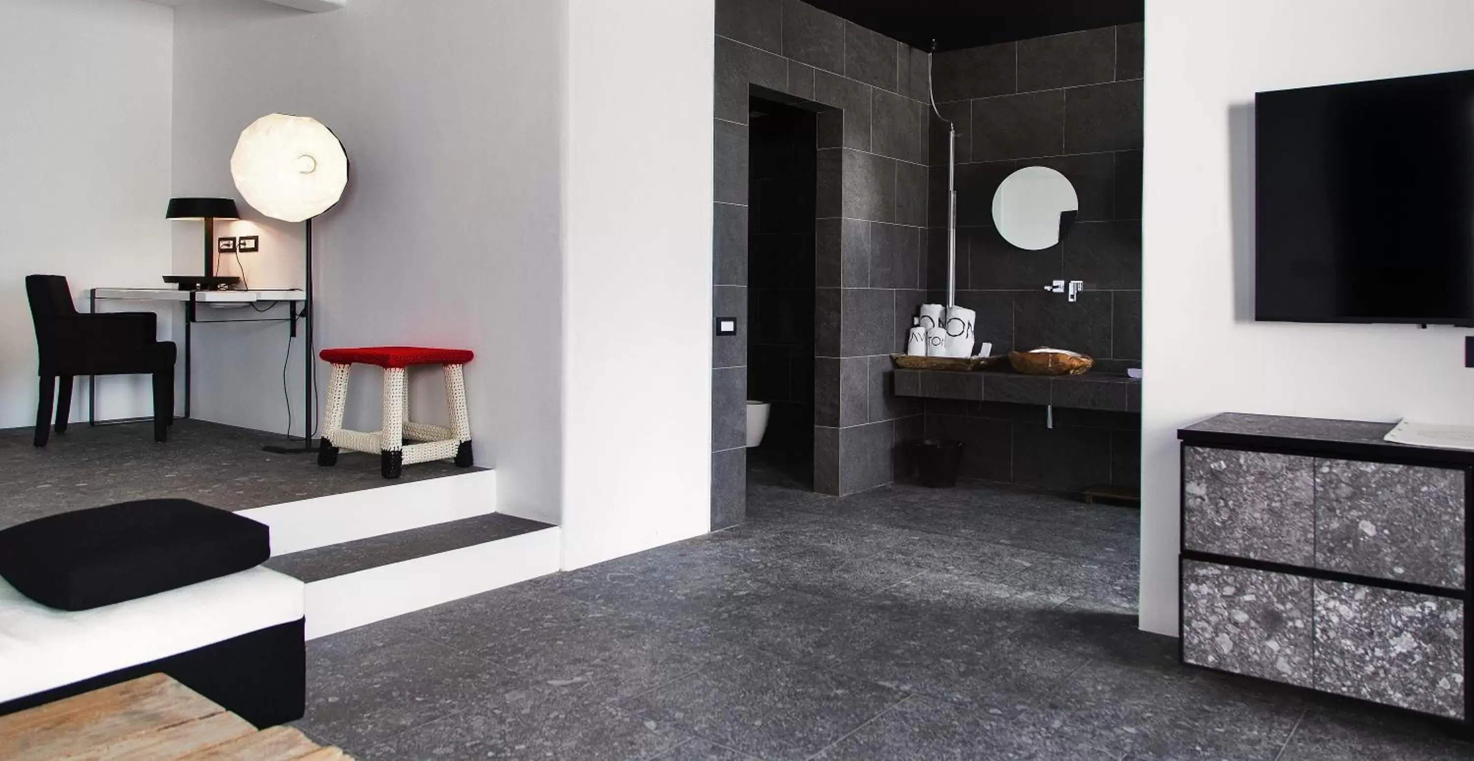 Bathroom, TV/Entertainment Center in Myconian Avaton - Design Hotels