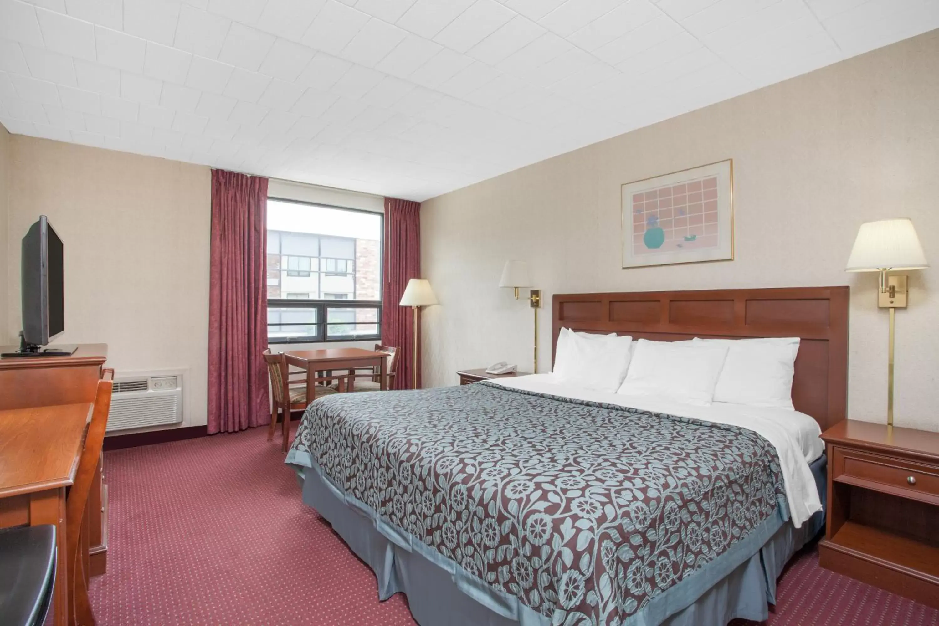Photo of the whole room, Bed in Days Inn by Wyndham Liberty