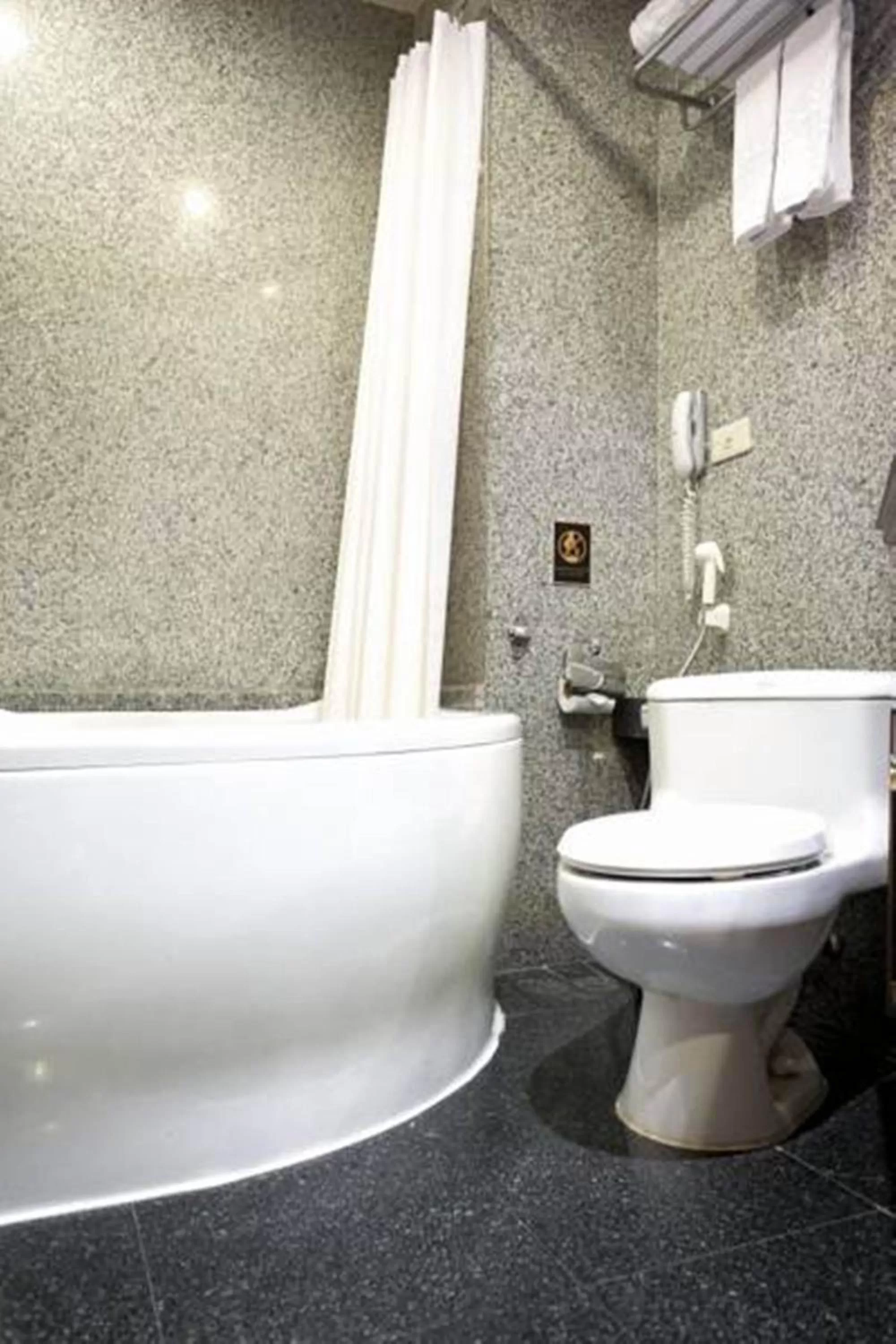 Bathroom in Majestic Suites Hotel