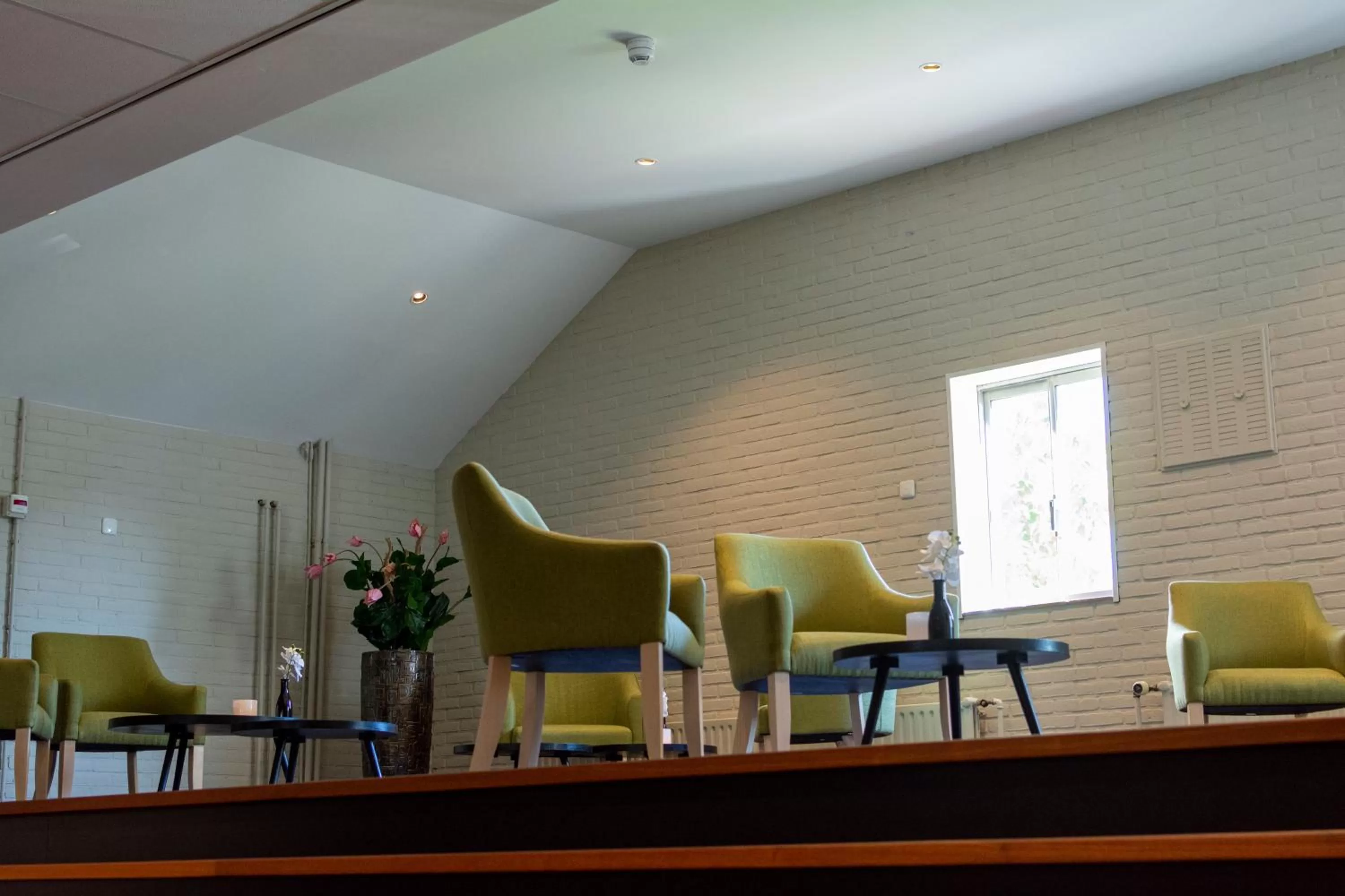 Seating area in Fletcher Hotel Restaurant De Gelderse Poort