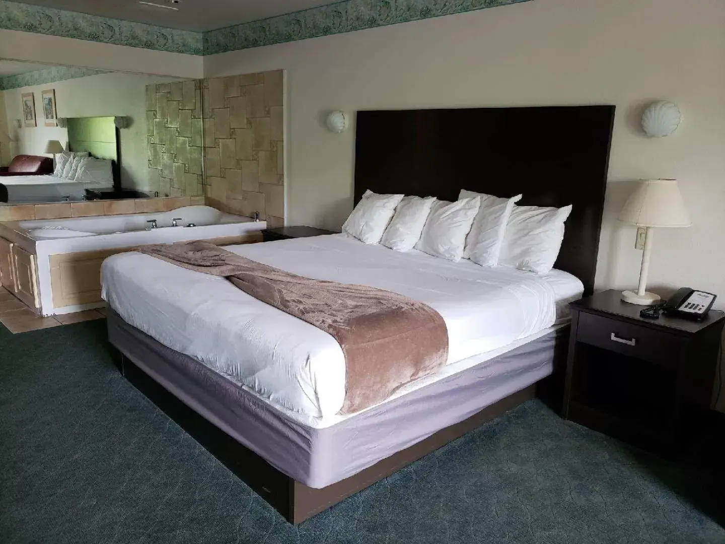 Bed in Atlantis Family Waterpark Hotel