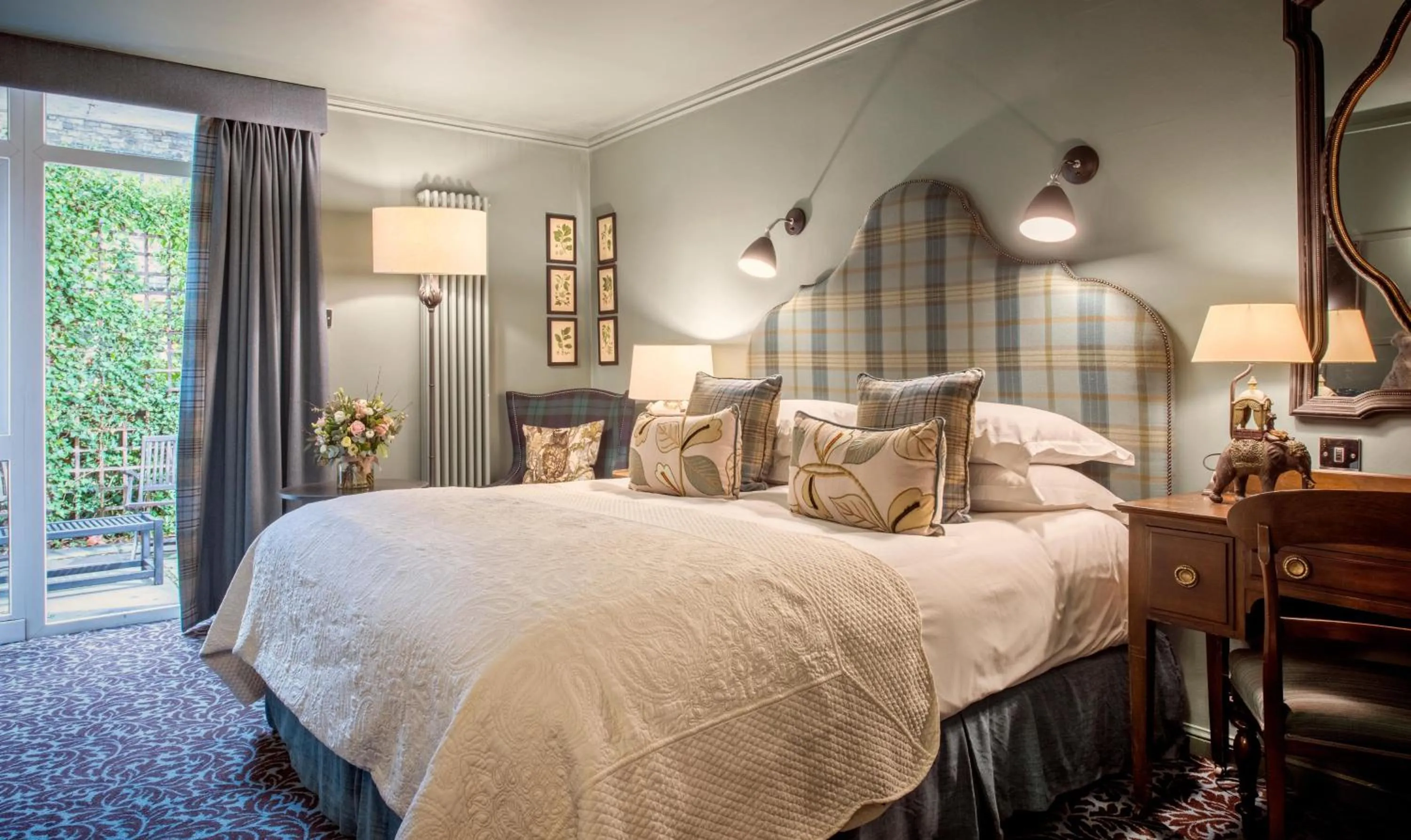 Bed in The Lygon Arms - an Iconic Luxury Hotel