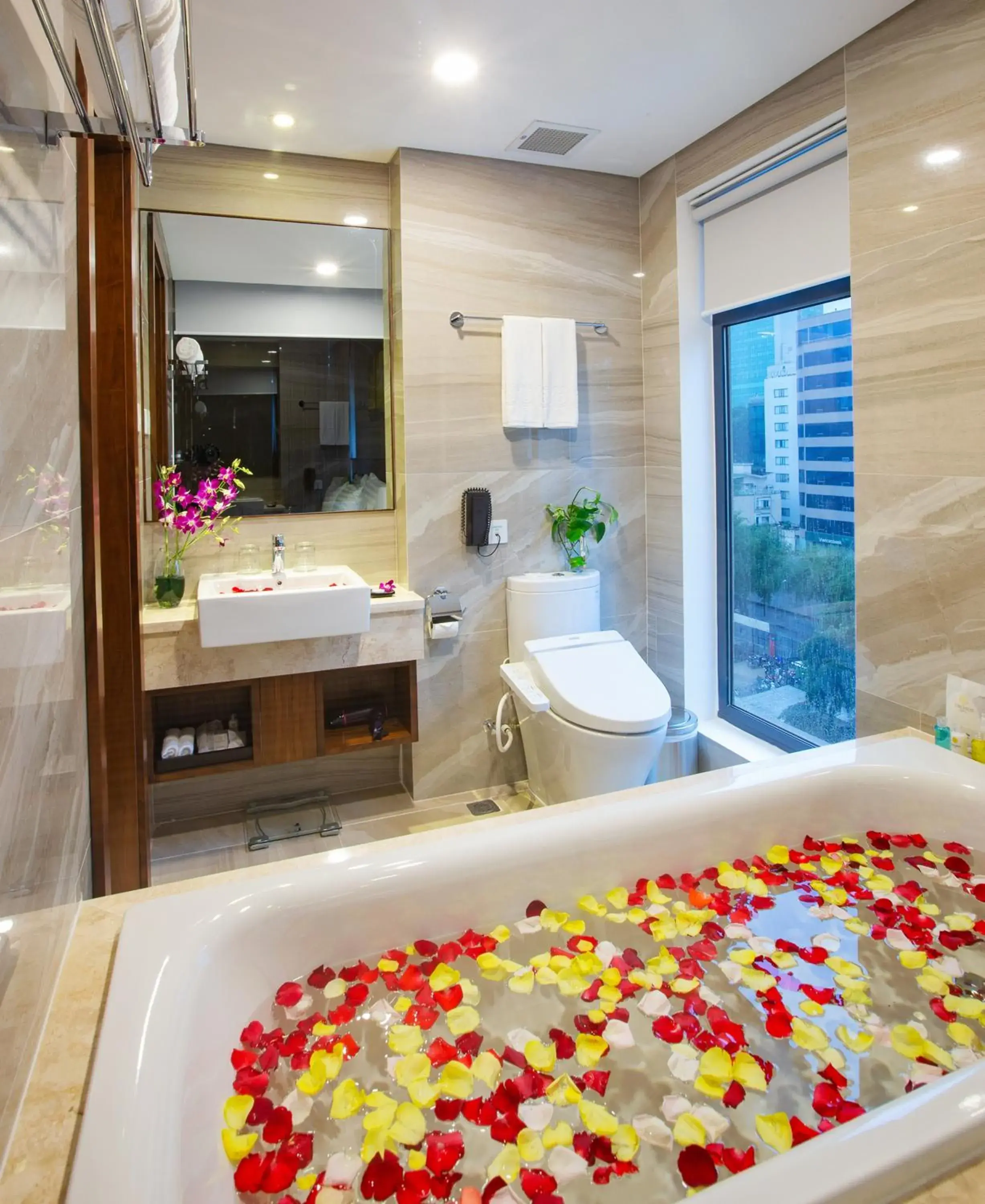 Bathroom in Orchids Saigon Hotel