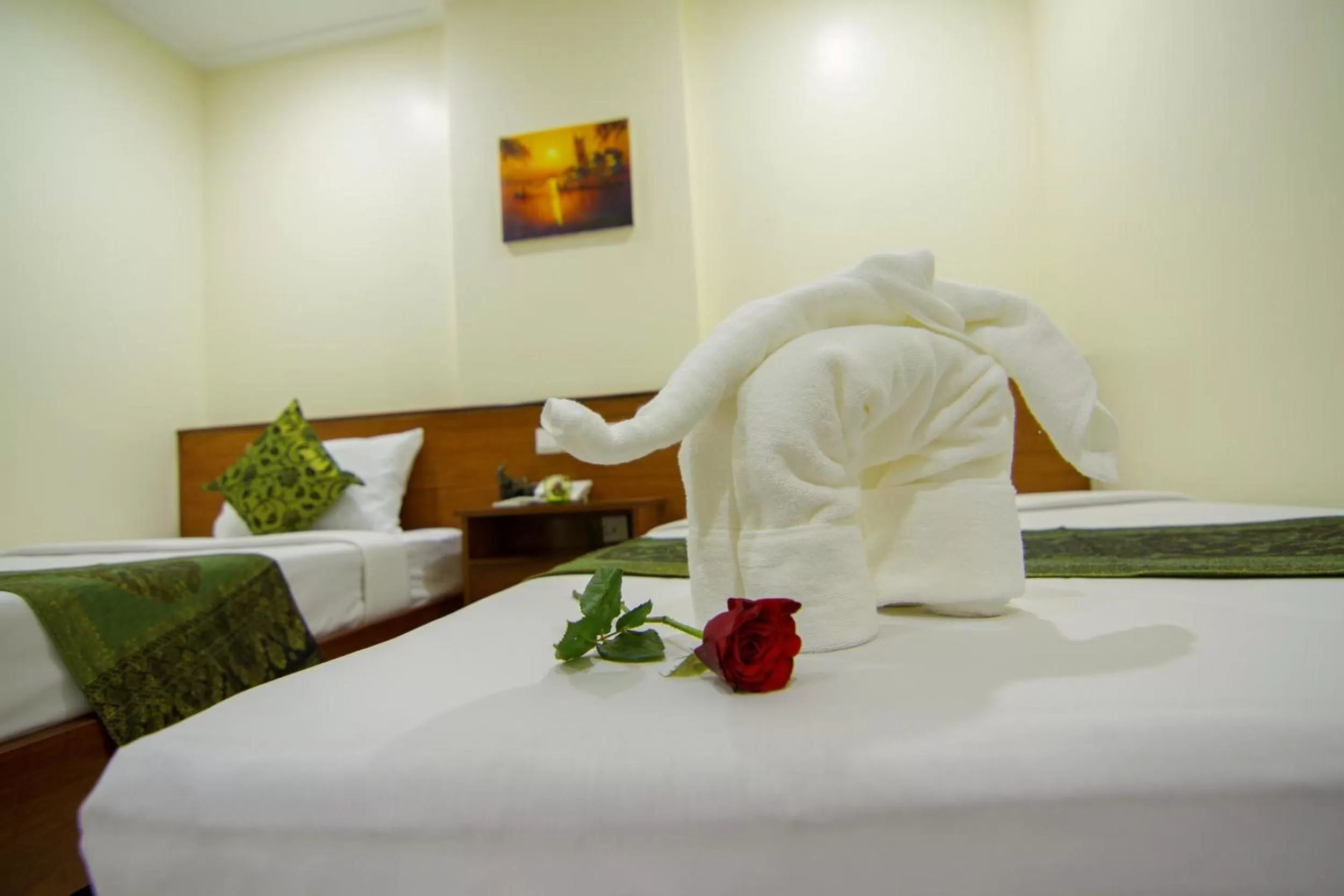 Bed in Rose Emerald Hotel