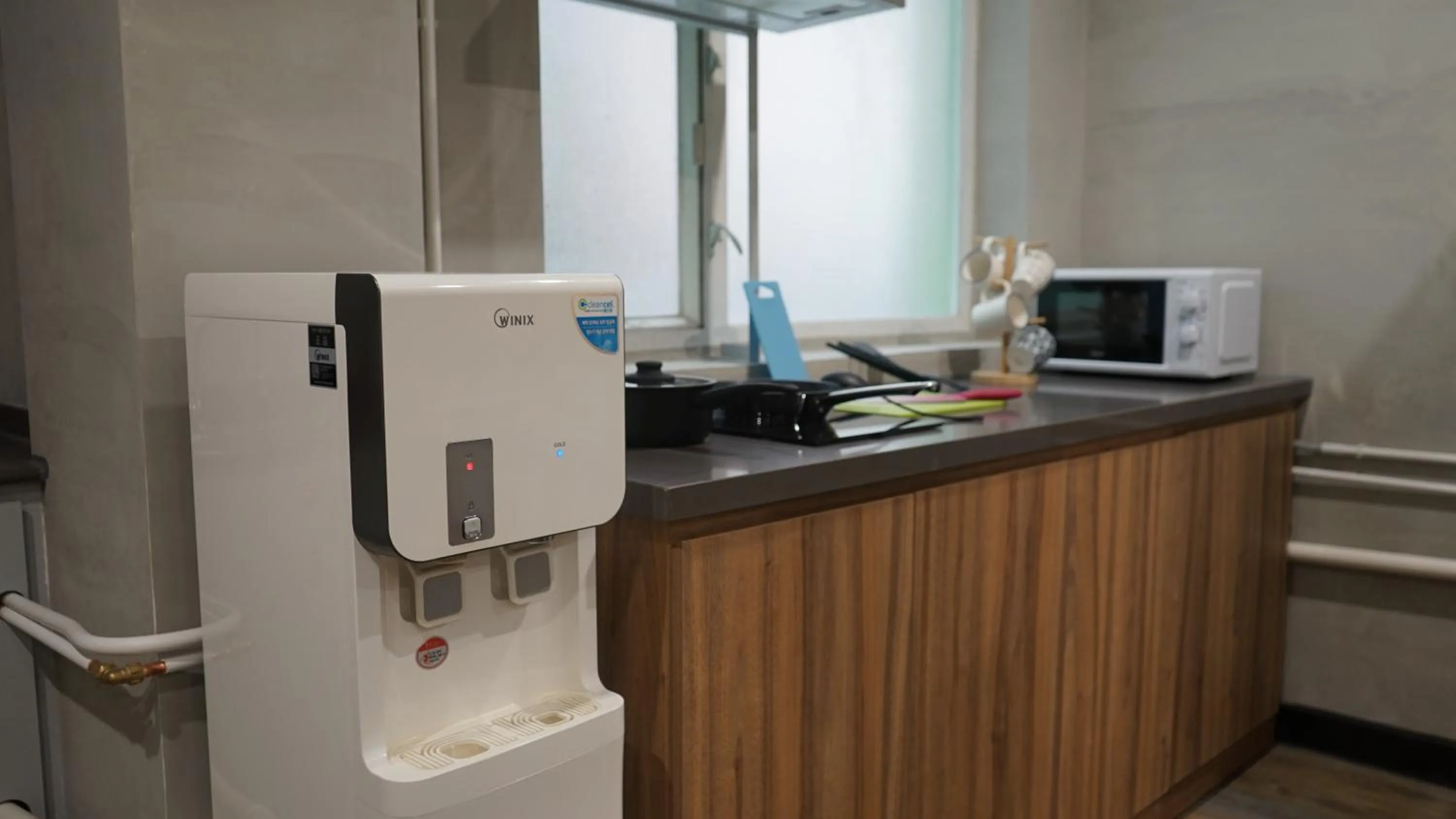 Communal kitchen in Homy Inn North Point