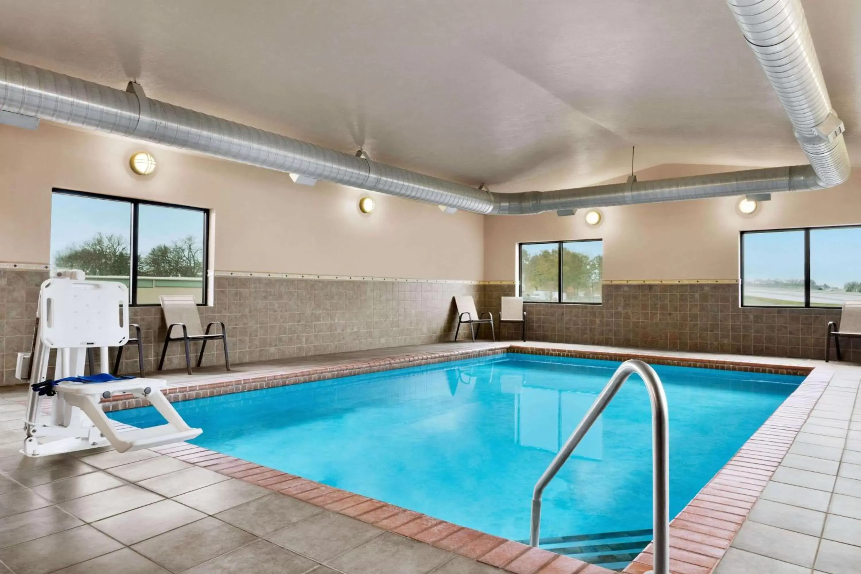 Pool view, Swimming Pool in Baymont by Wyndham Sioux Falls North I-29 and Russell Street