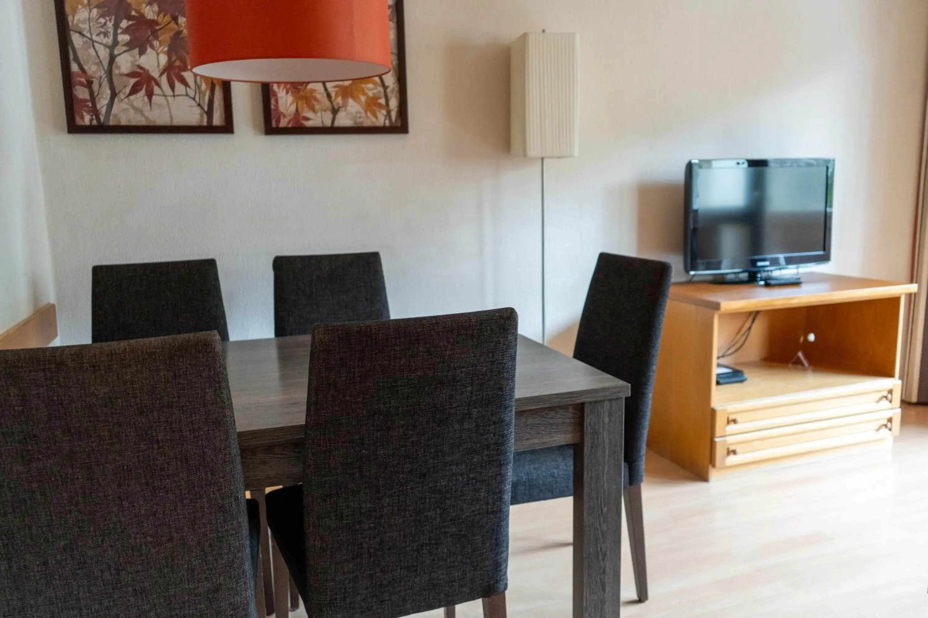 Dining area, TV/Entertainment Center in Ramada Residences by Wyndham Saalfelden