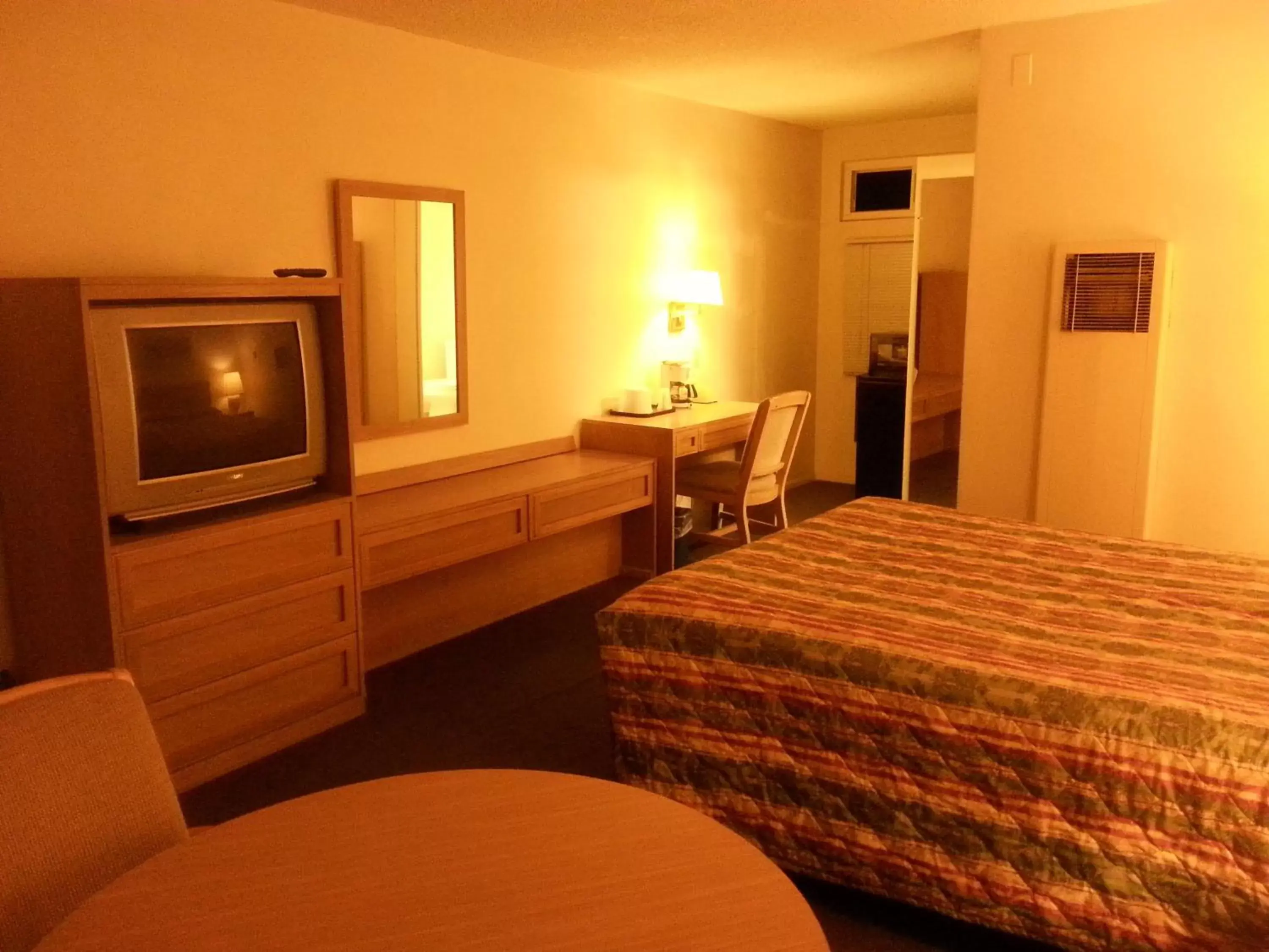 Photo of the whole room, TV/Entertainment Center in Villa Motel