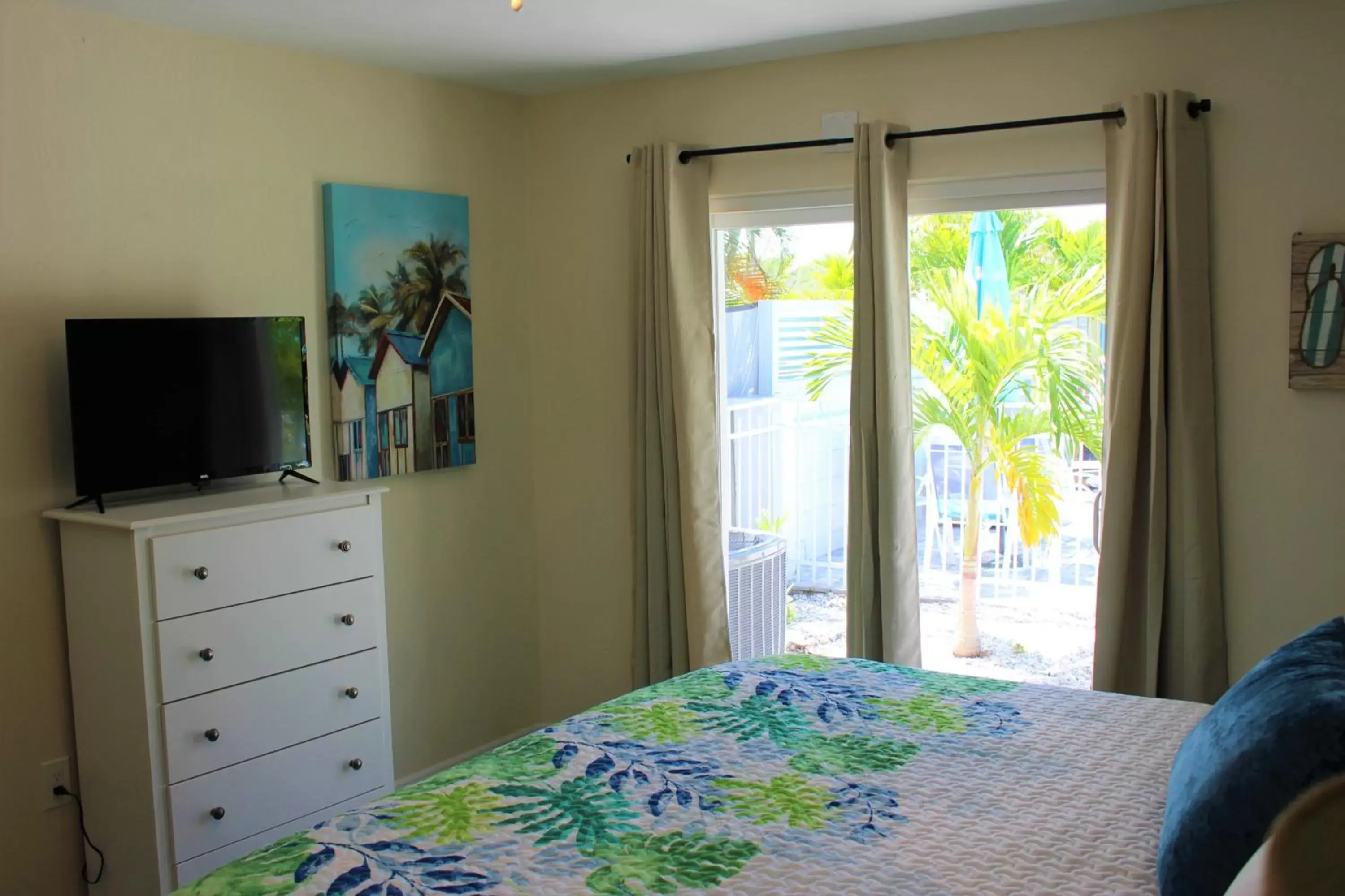 Bed in Latitude 26 Waterfront Boutique Resort - Fort Myers Beach