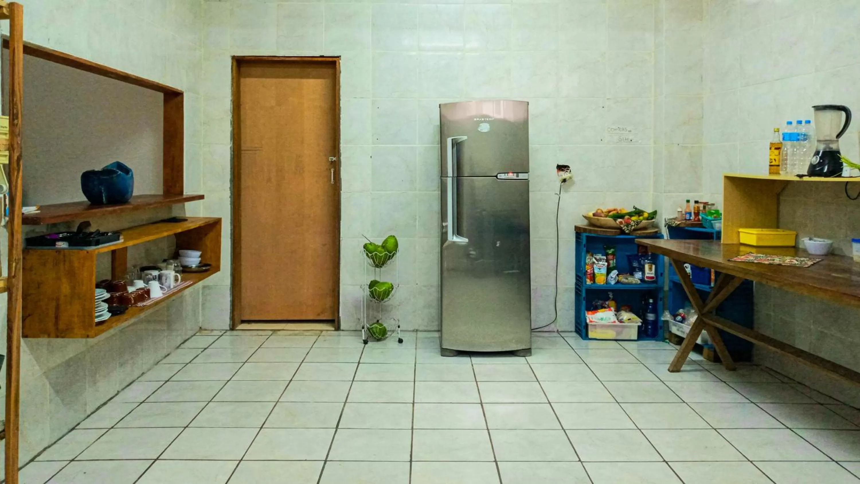 Kitchen or kitchenette in Pousada e Hostel Marthi