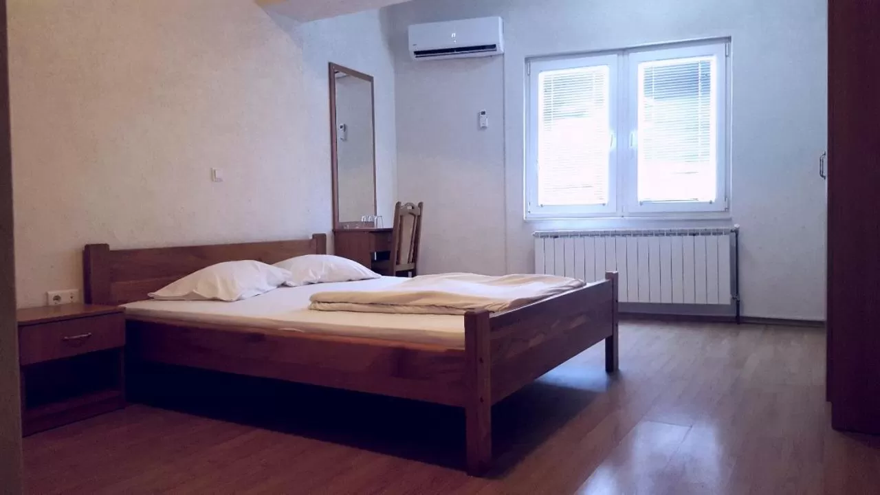 Bed in Motel Gas-Petrol