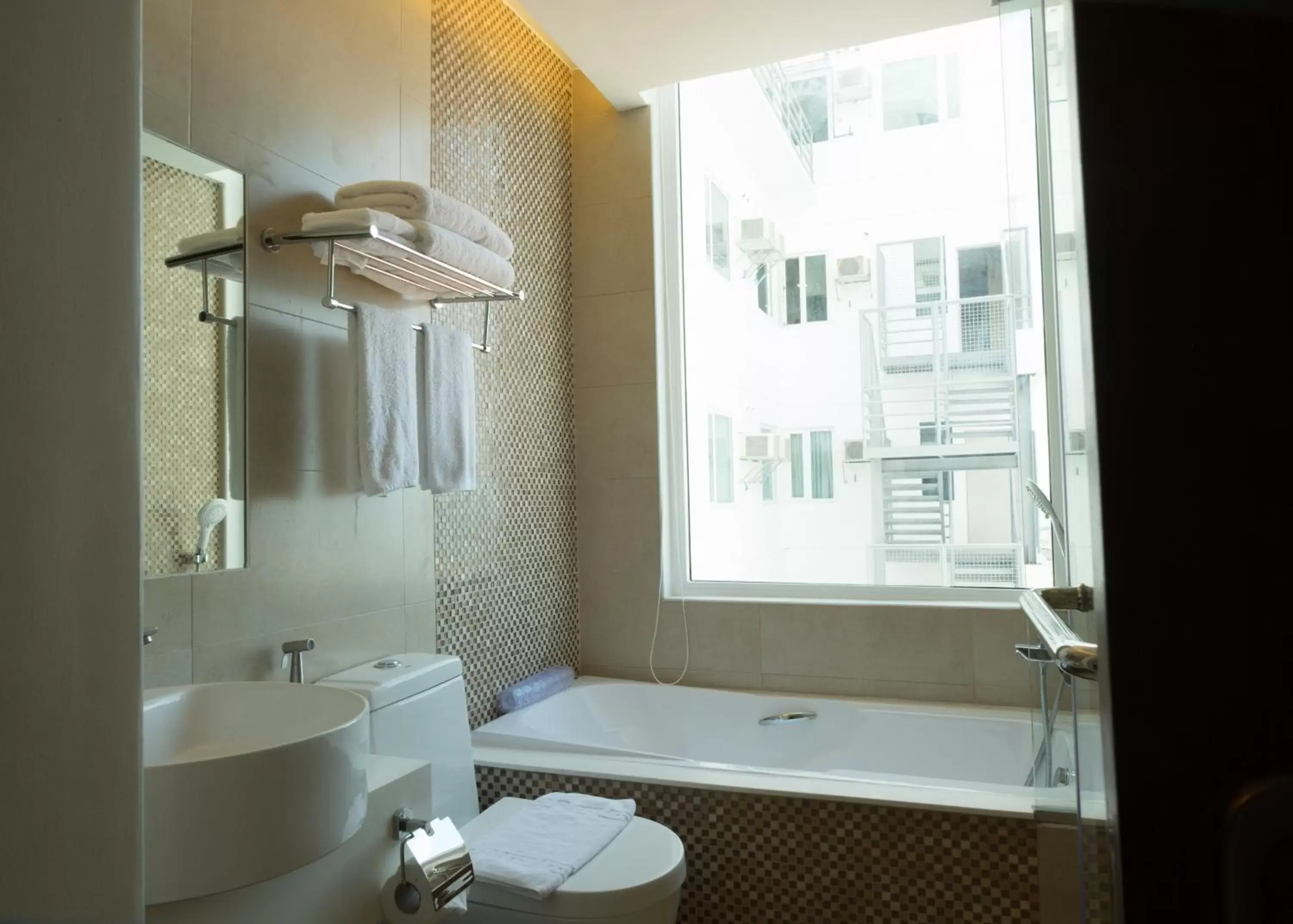 Shower, Bathroom in One Central Hotel & Suites